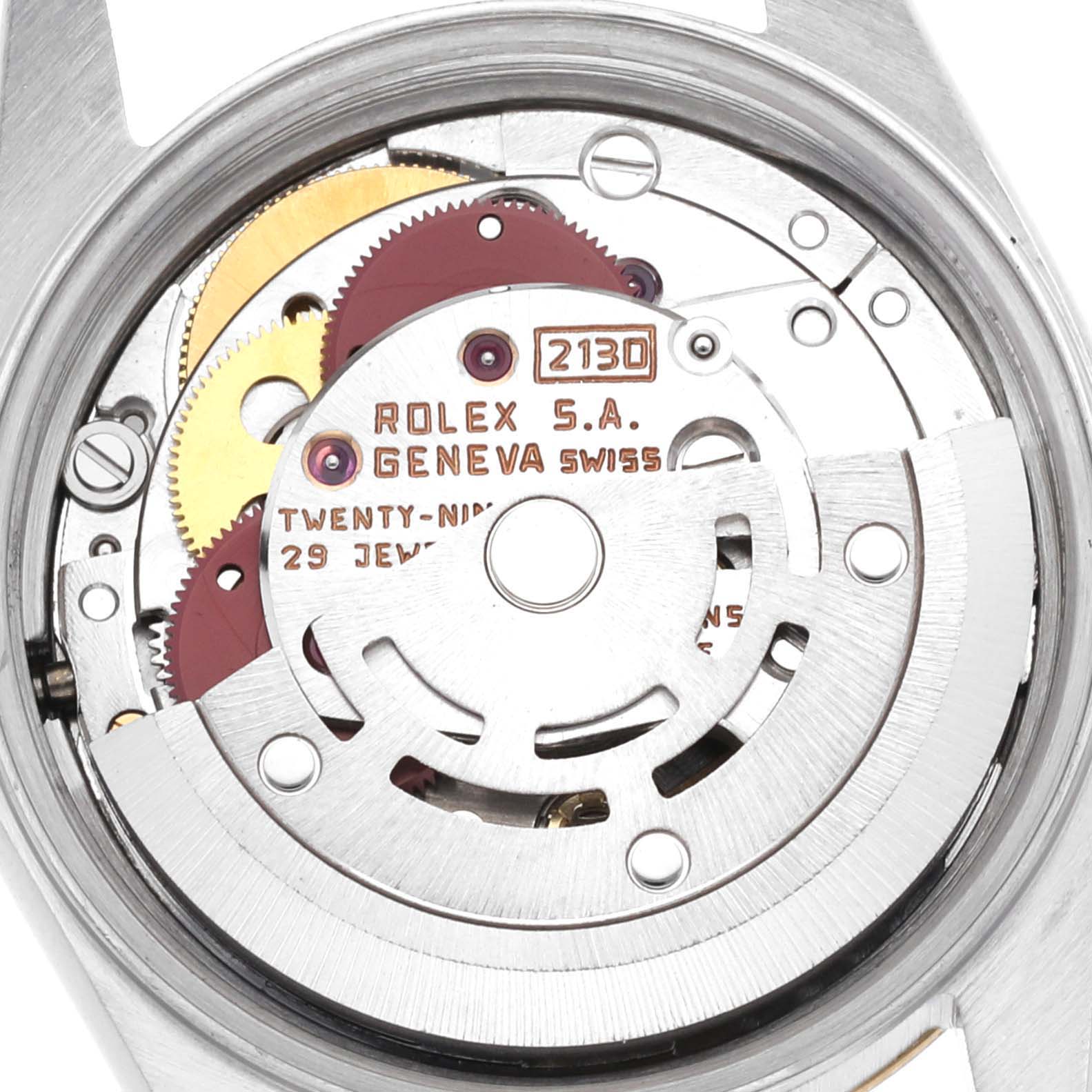 The image shows the internal movement mechanism of the Rolex Oyster Perpetual 67193 Women's Steel and Gold (two tone) Champagne Dial 67193 Women's Steel and Gold (two tone) Champagne Dial watch from a top-down angle.