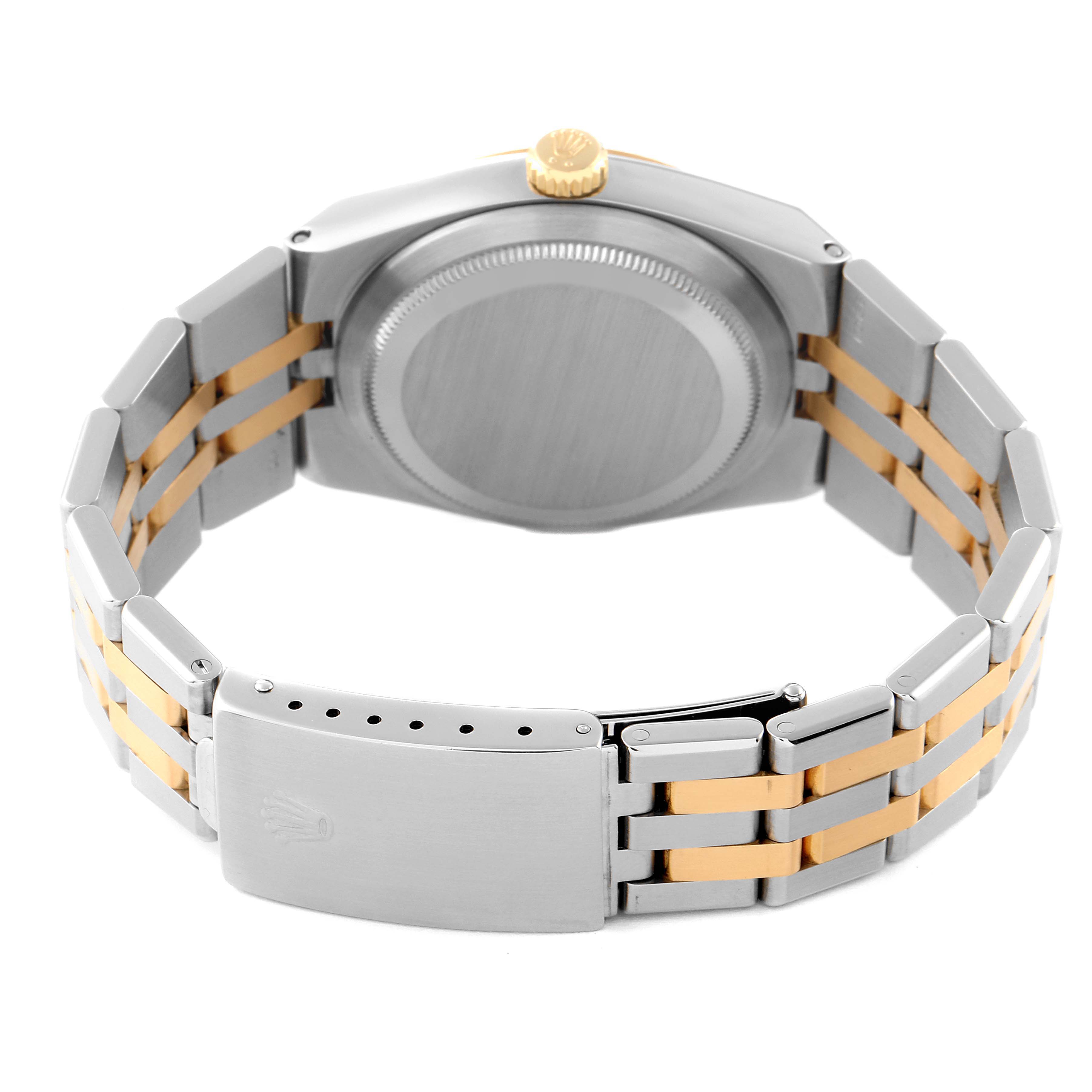 This is a rear view of the Rolex Datejust 17013 Men's Steel and Gold (two tone) Black Dial 17013 Men's Steel and Gold (two tone) Black Dial watch, showing the case back, crown, and two-tone bracelet with clasp.