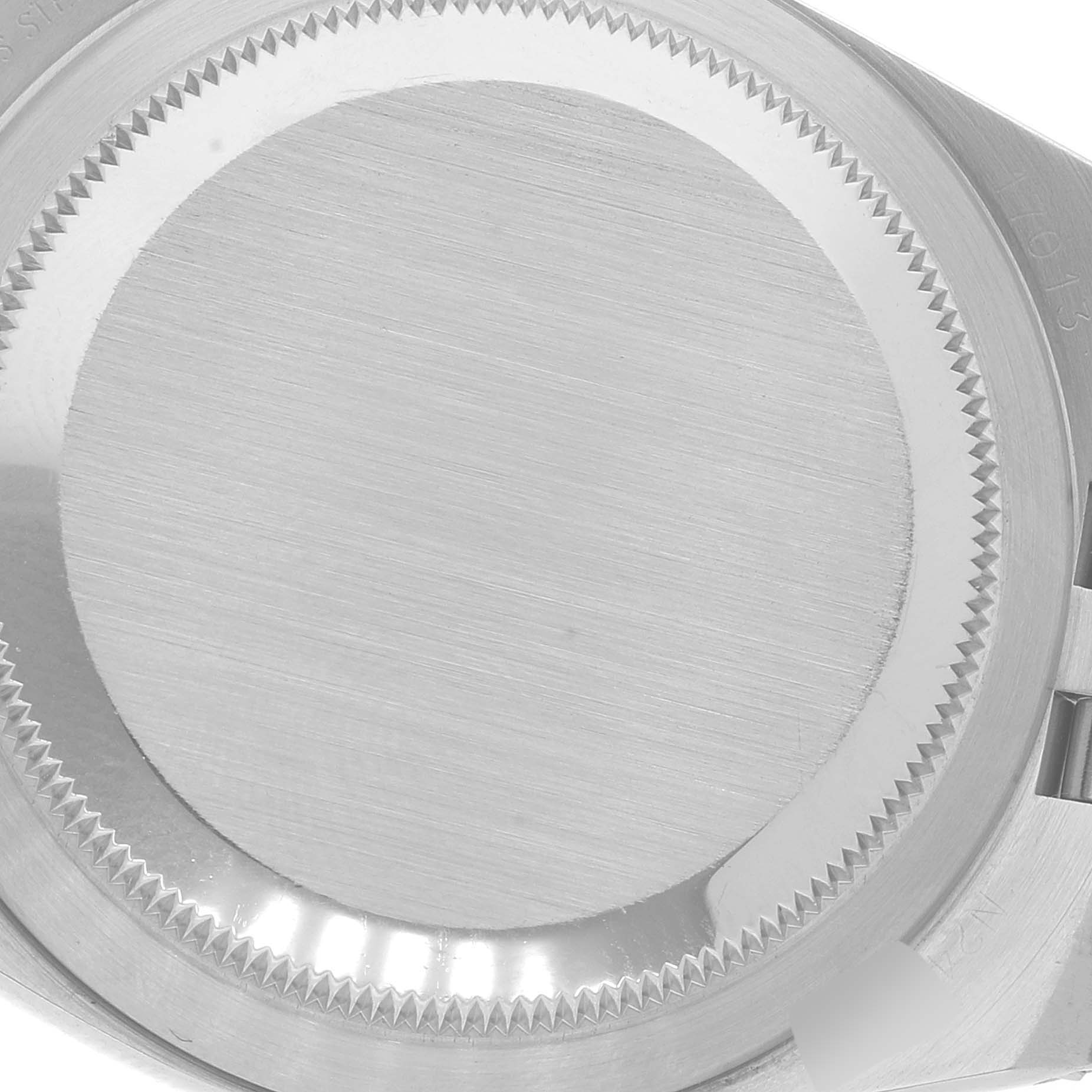 This image shows the back case of a Rolex Datejust 17013 Men's Steel and Gold (two tone) Black Dial 17013 Men's Steel and Gold (two tone) Black Dial model watch from a close-up angle.