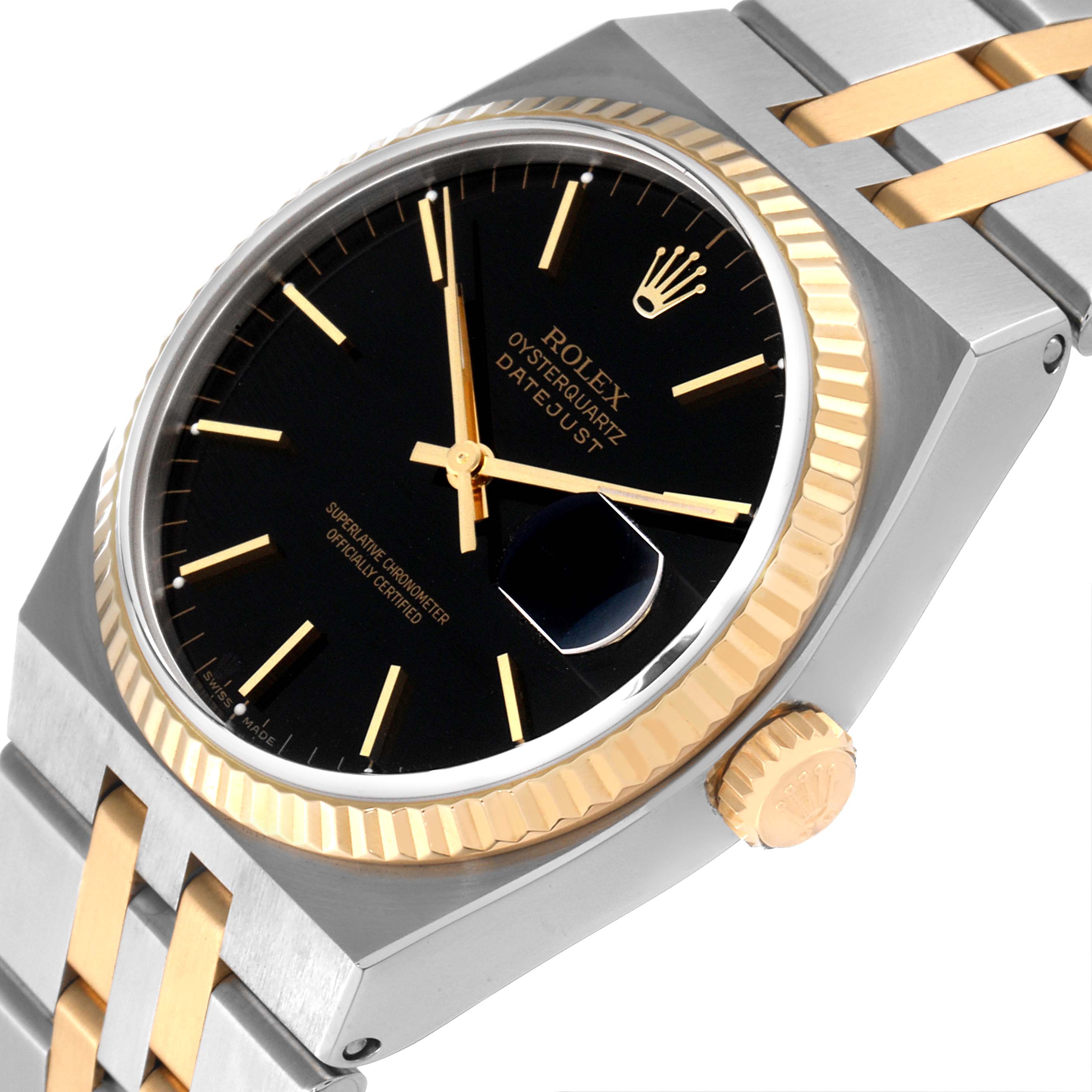 This image shows a close-up of the Rolex Datejust 17013 Men's Steel and Gold (two tone) Black Dial 17013 Men's Steel and Gold (two tone) Black Dial's face, bezel, and part of the two-tone bracelet from an angled view.