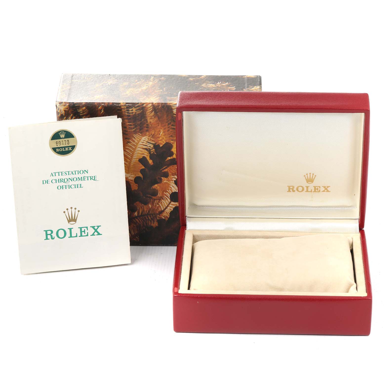 The image shows a storage box and certificate for a Rolex President 69178 Women
s Yellow Gold Purple Dial 69178 Women
s Yellow Gold Purple Dial model watch.