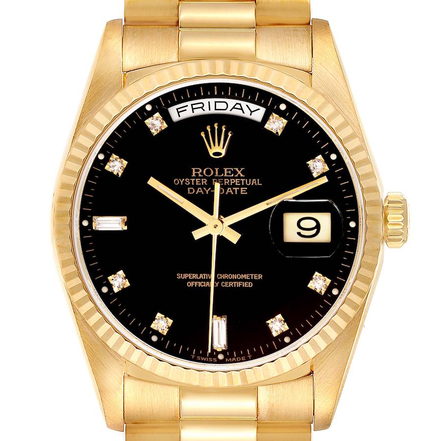 Front view of a Rolex President model watch showing the dial, day and date display, hands, and part of the bracelet.