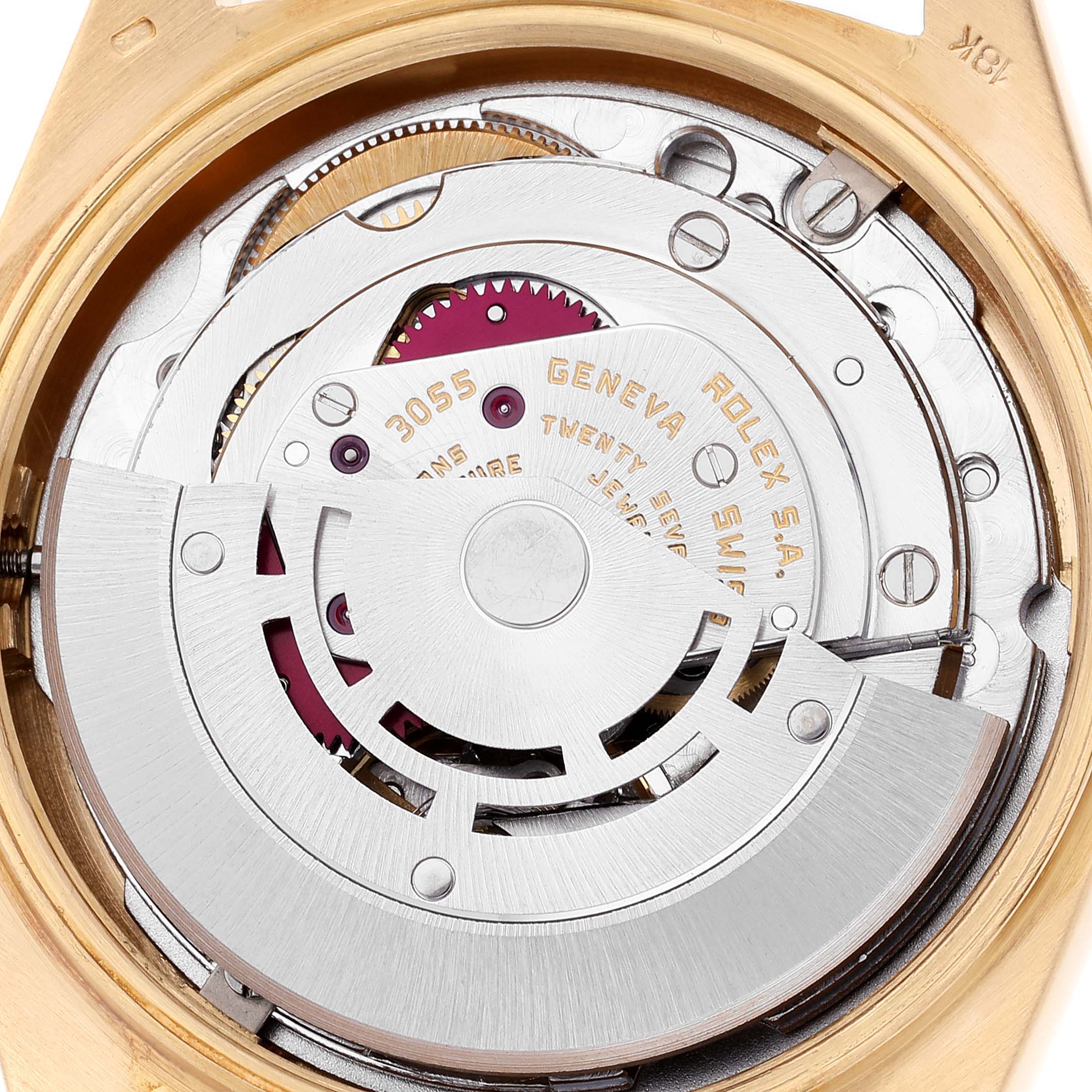 The image shows the internal mechanism of a Rolex President 18038 Men's Yellow Gold Champagne Dial 18038 Men's Yellow Gold Champagne Dial model watch viewed from the back, highlighting the intricate movement parts.