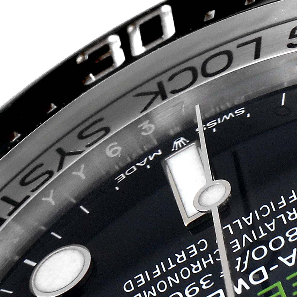 The image shows a close-up of the bezel and dial of the Rolex Sea-Dweller 126660 Men's Stainless Steel Blue Dial 126660 Men's Stainless Steel Blue Dial watch, highlighting the text and markings.