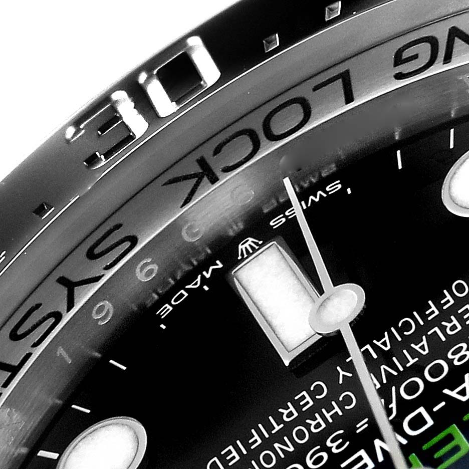 A close-up angled view of the Rolex Sea-Dweller 126660 Men
s Stainless Steel Blue Dial 126660 Men
s Stainless Steel Blue Dial watch, showing part of the bezel, dial, and hour hand.