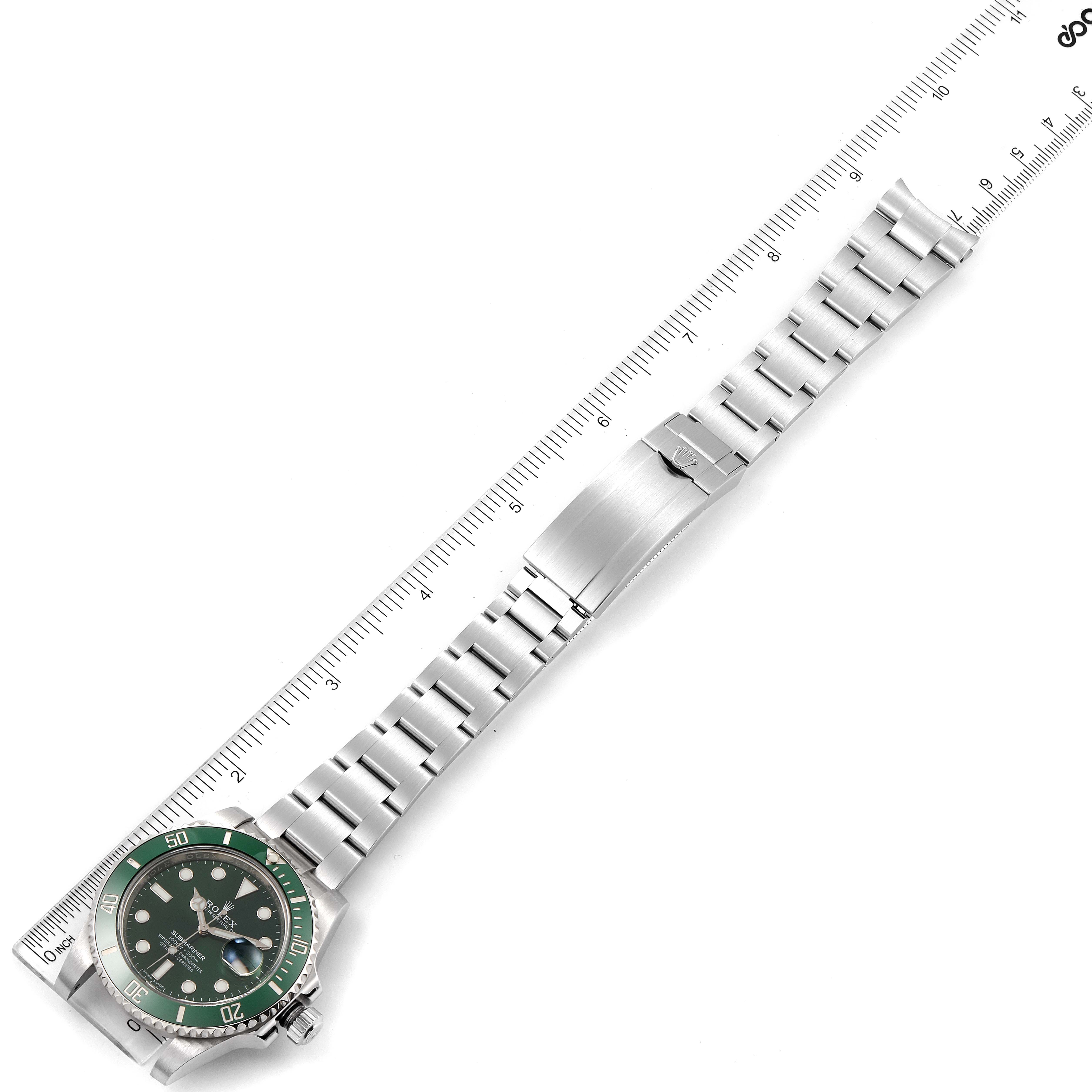 The image shows a Rolex Submariner 116610LV Men
s Stainless Steel Green Dial 116610LV Men
s Stainless Steel Green Dial watch from a top-down angle, displaying the face, bezel, and full bracelet.
