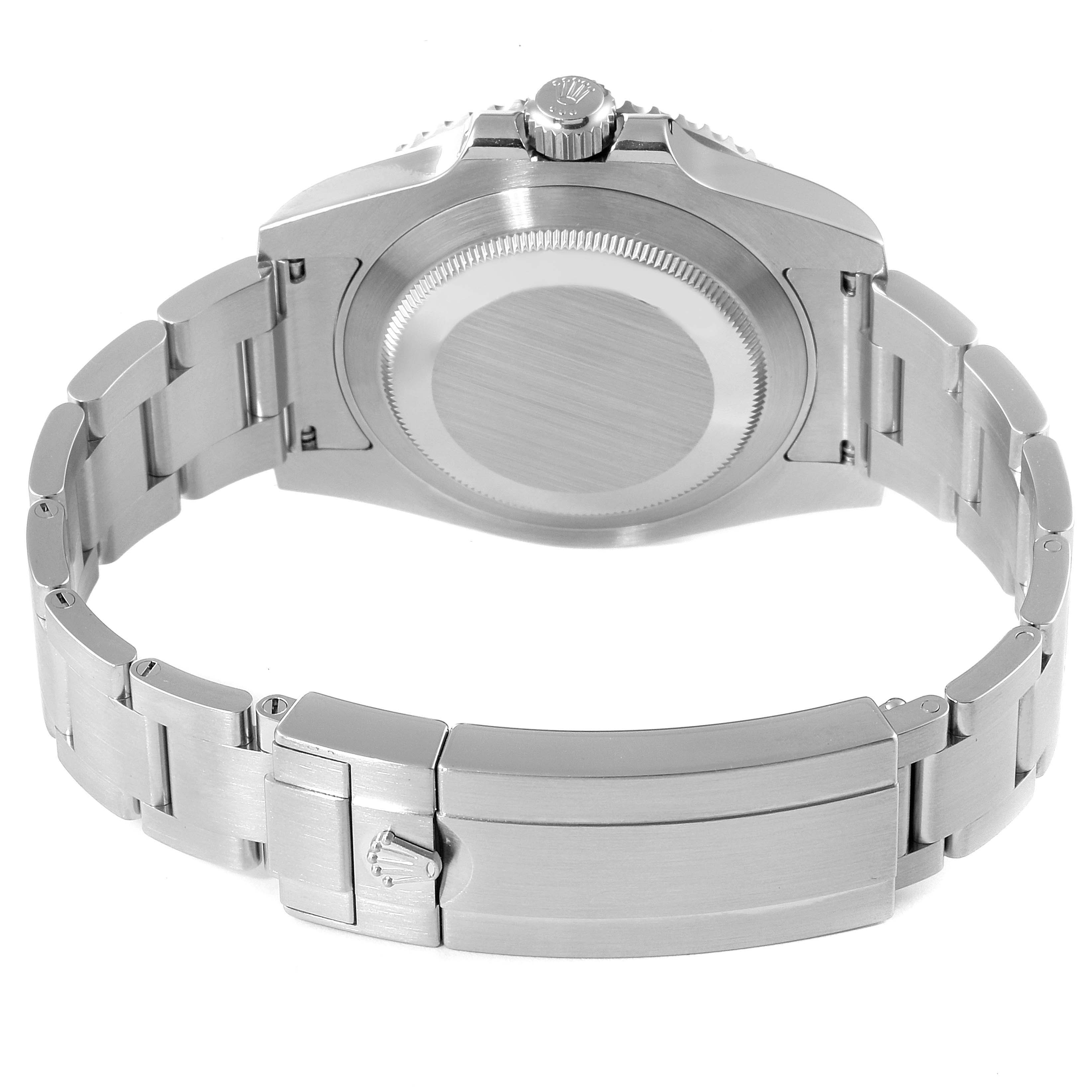 The image shows the back view of a Rolex Submariner 116610LV Men
s Stainless Steel Green Dial 116610LV Men
s Stainless Steel Green Dial watch, highlighting the bracelet, clasp, and case back.