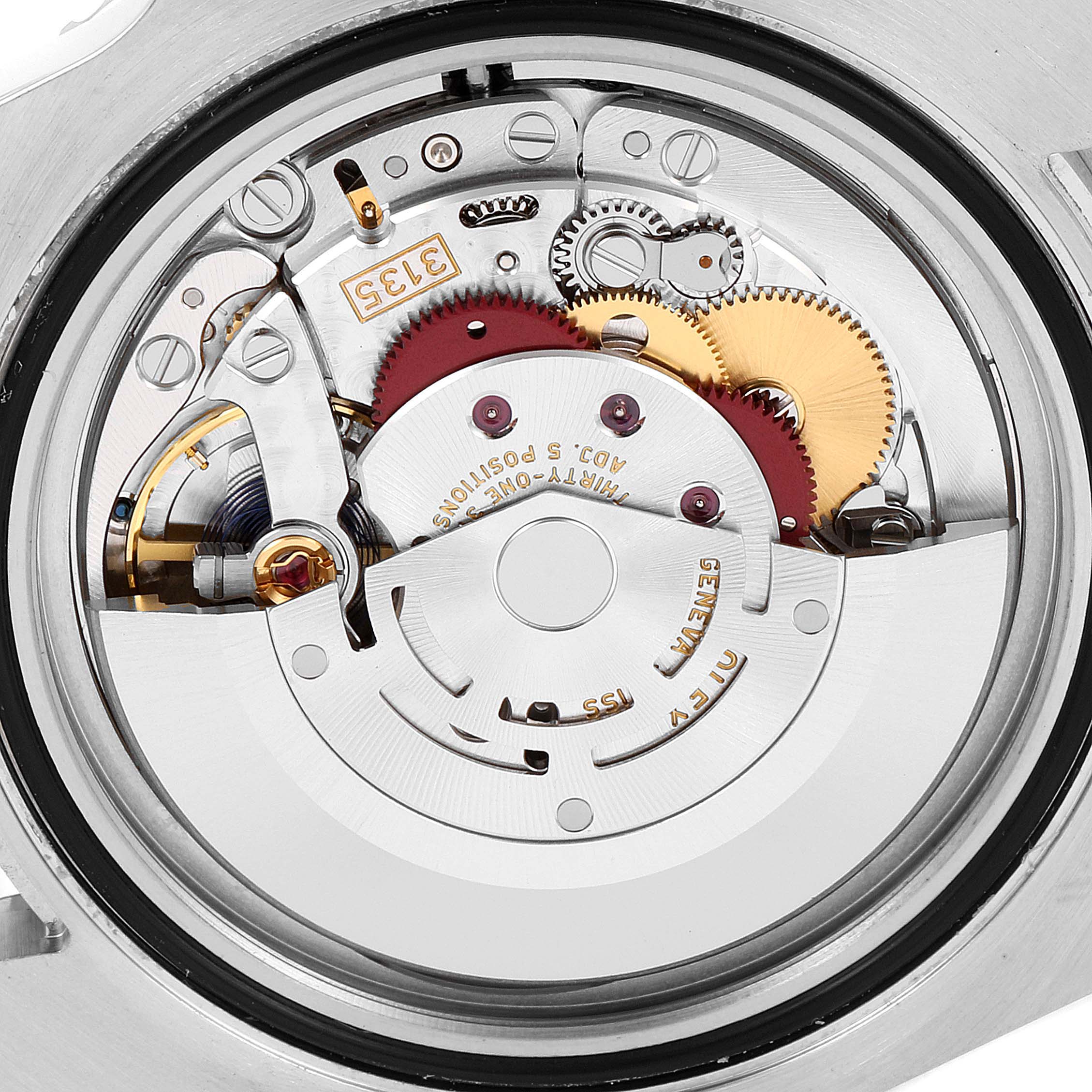 A close-up of the Rolex Submariner 116610LV Men
s Stainless Steel Green Dial 116610LV Men
s Stainless Steel Green Dial
s inner mechanical movement, showcasing gears and intricate components.