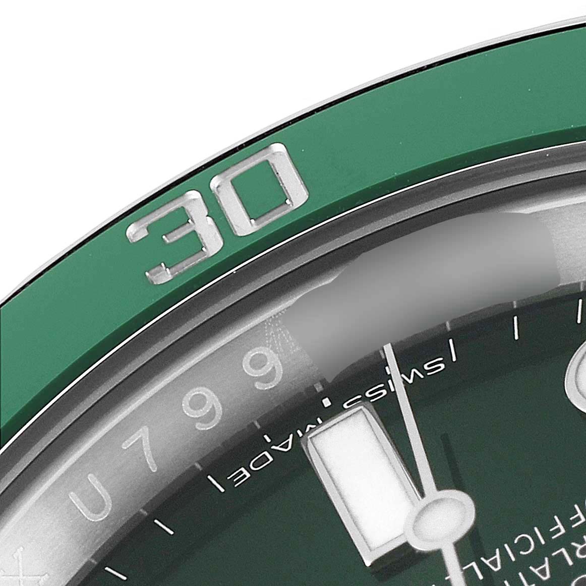 The image shows a close-up of the green bezel and part of the dial on a Rolex Submariner 116610LV Men
s Stainless Steel Green Dial 116610LV Men
s Stainless Steel Green Dial watch at an angle.