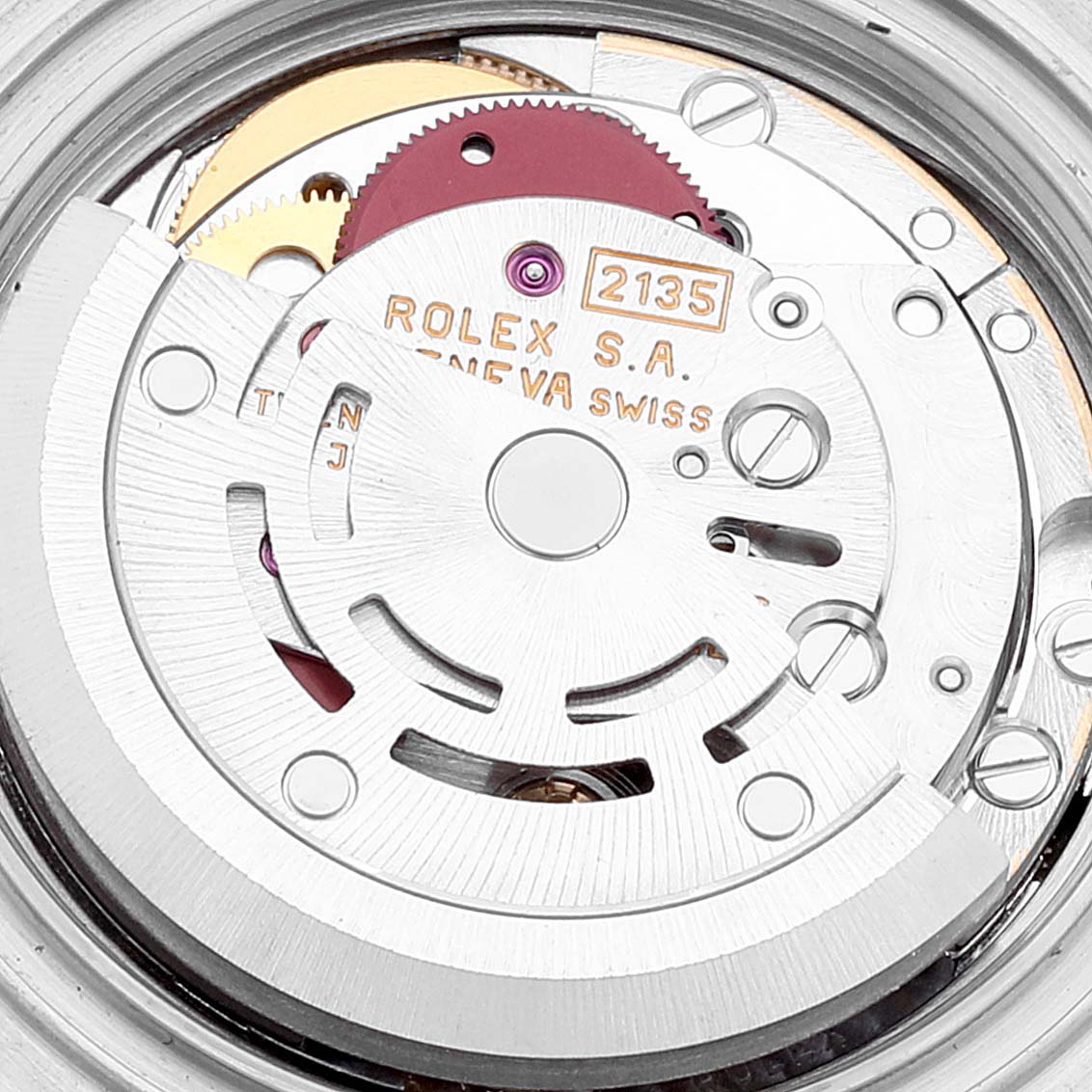 This is a close-up view of the Rolex Yacht-Master 69623 Women's Steel and Gold (two tone) Grey Dial 69623 Women's Steel and Gold (two tone) Grey Dial model's internal mechanism and movement parts.