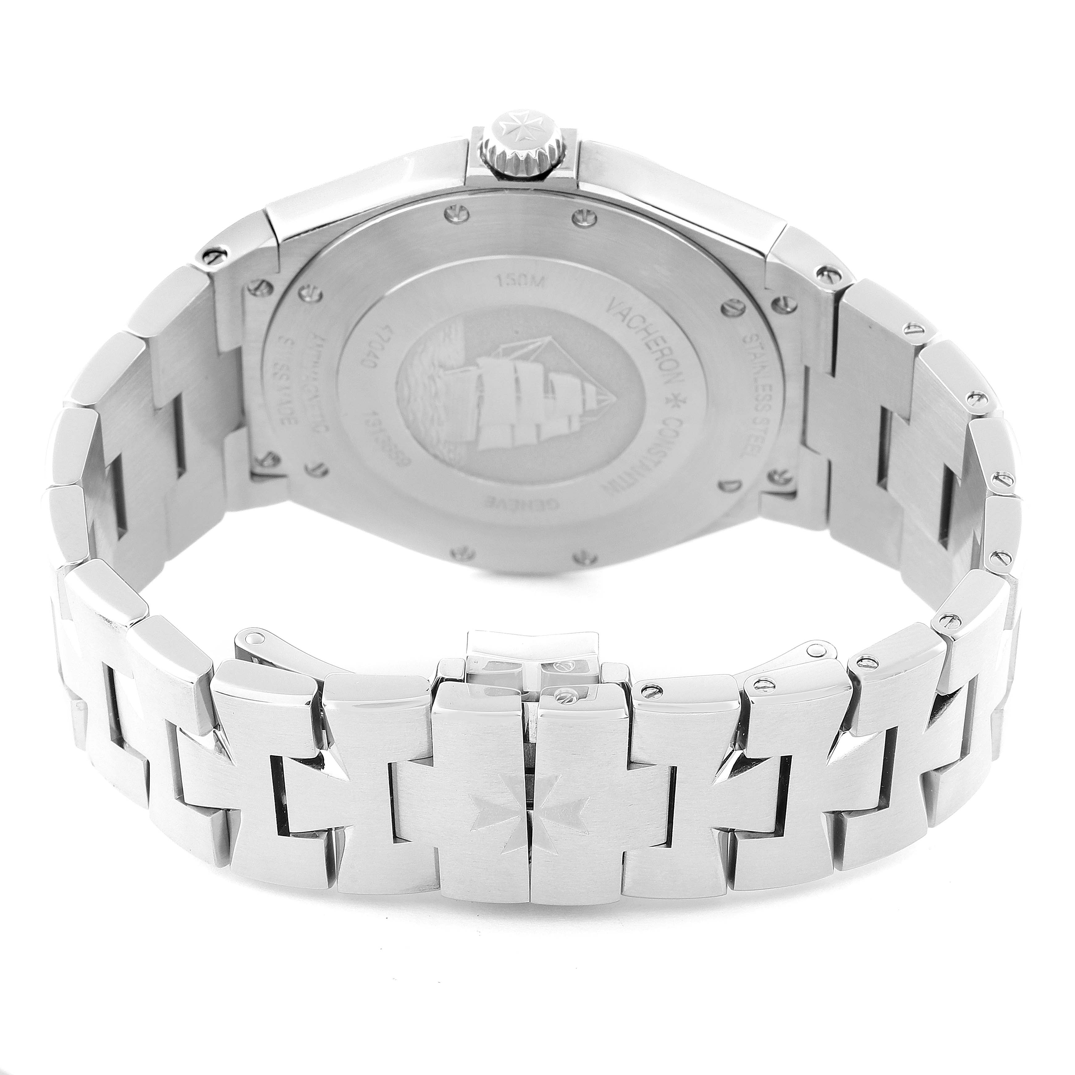 The image shows the back case and metal bracelet of the Vacheron Constantin Overseas 47040B01A-9093 Men's Stainless Steel Silver Dial 47040B01A-9093 Men's Stainless Steel Silver Dial watch, highlighting the detailed engraving and clasp.