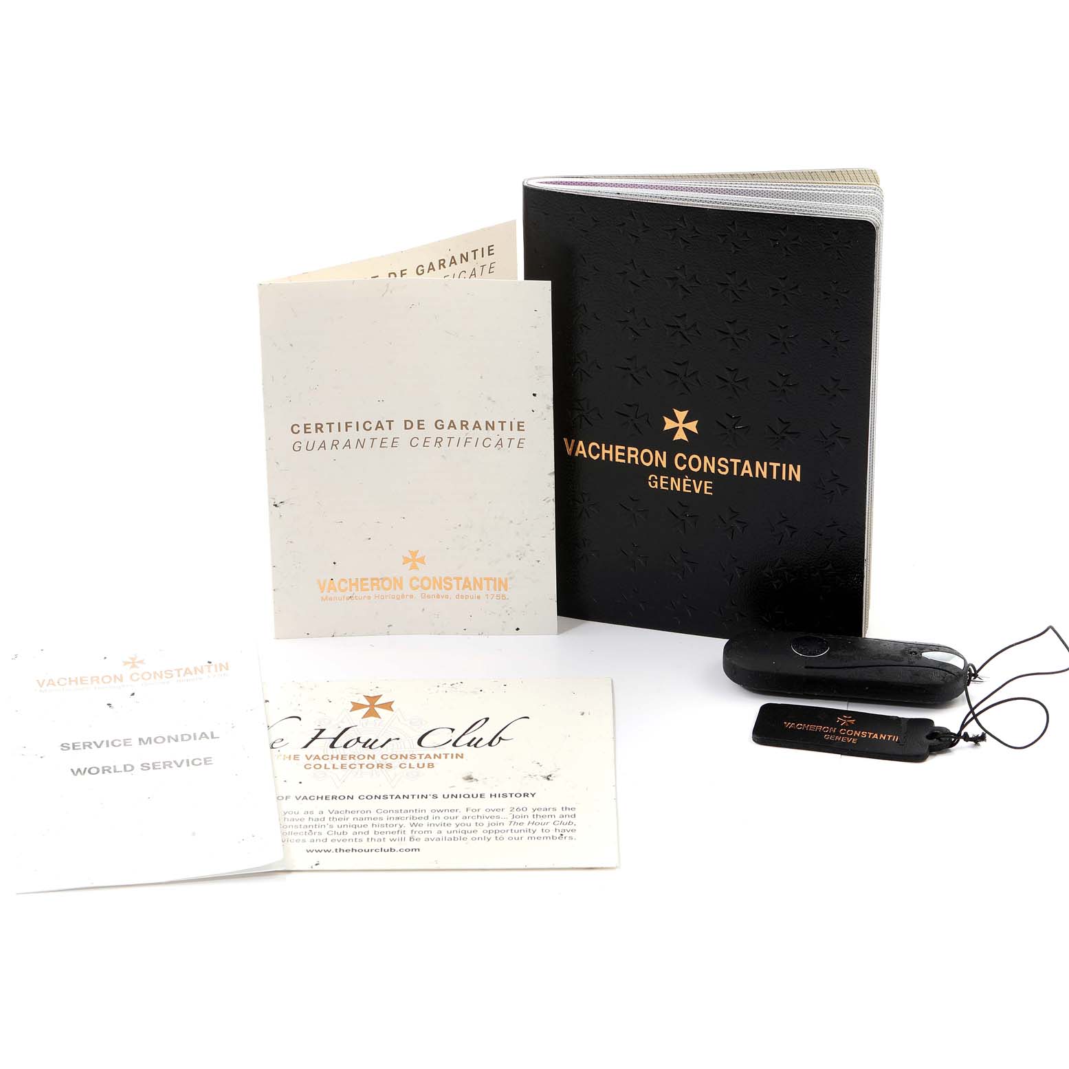 The image shows the warranty card, user manual, service booklets, and a pouch for the Vacheron Constantin Overseas 47040B01A-9093 Men's Stainless Steel Silver Dial 47040B01A-9093 Men's Stainless Steel Silver Dial model watch.