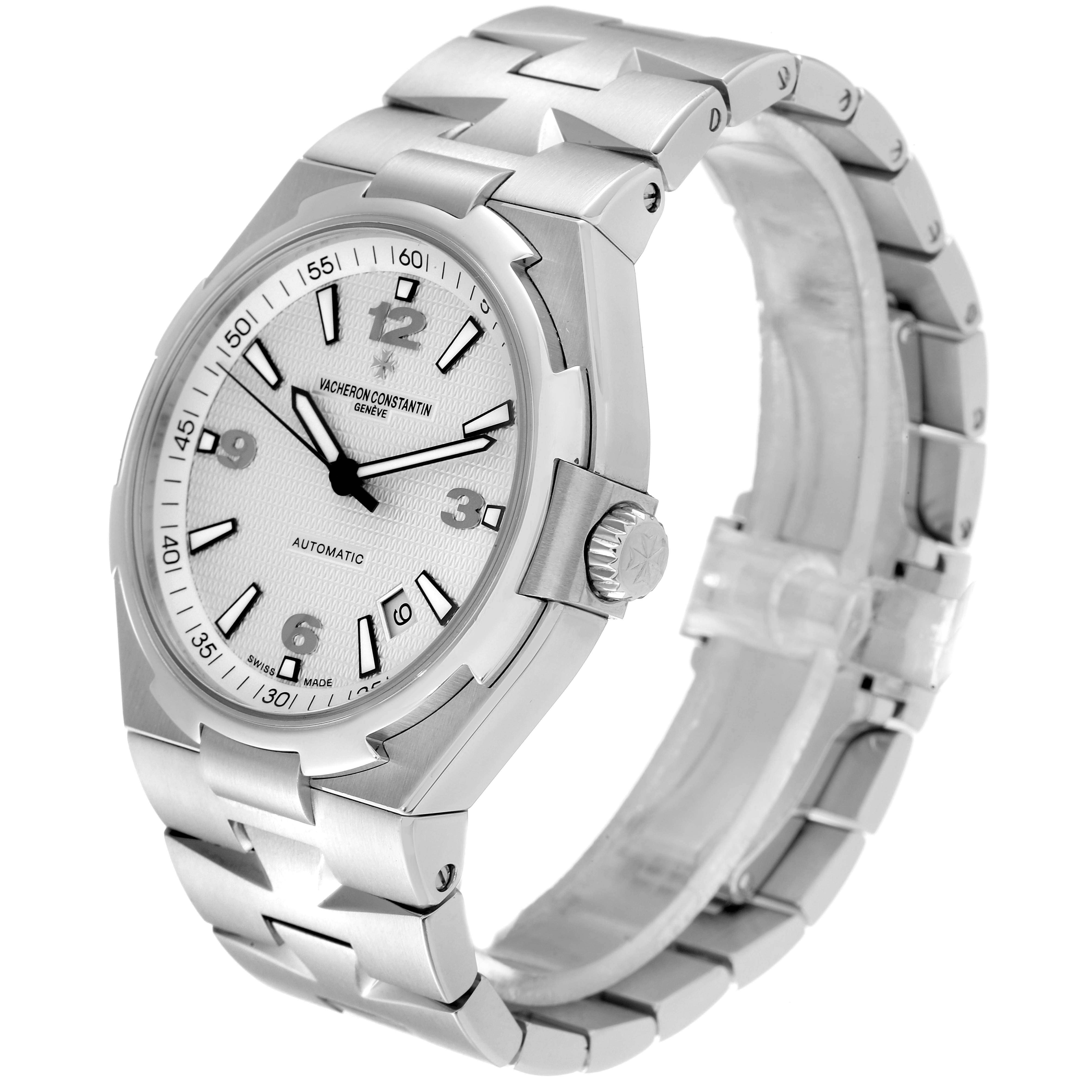 The Vacheron Constantin Overseas 47040B01A-9093 Men's Stainless Steel Silver Dial 47040B01A-9093 Men's Stainless Steel Silver Dial watch is shown from an angled side view, highlighting the face, bezel, crown, and bracelet.