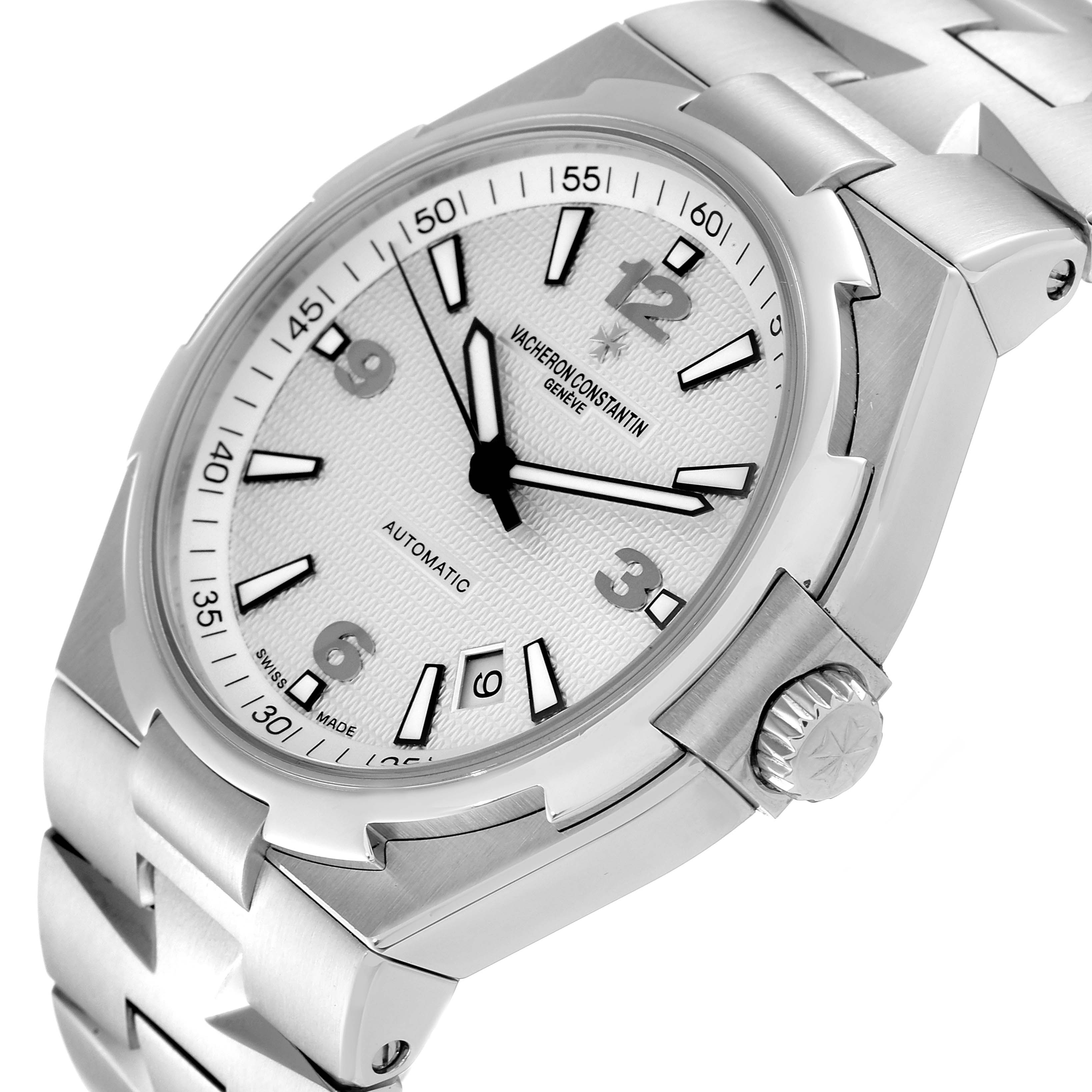 The image shows a Vacheron Constantin Overseas 47040B01A-9093 Men's Stainless Steel Silver Dial 47040B01A-9093 Men's Stainless Steel Silver Dial model watch from an angled side view, highlighting the dial, bezel, and bracelet links.