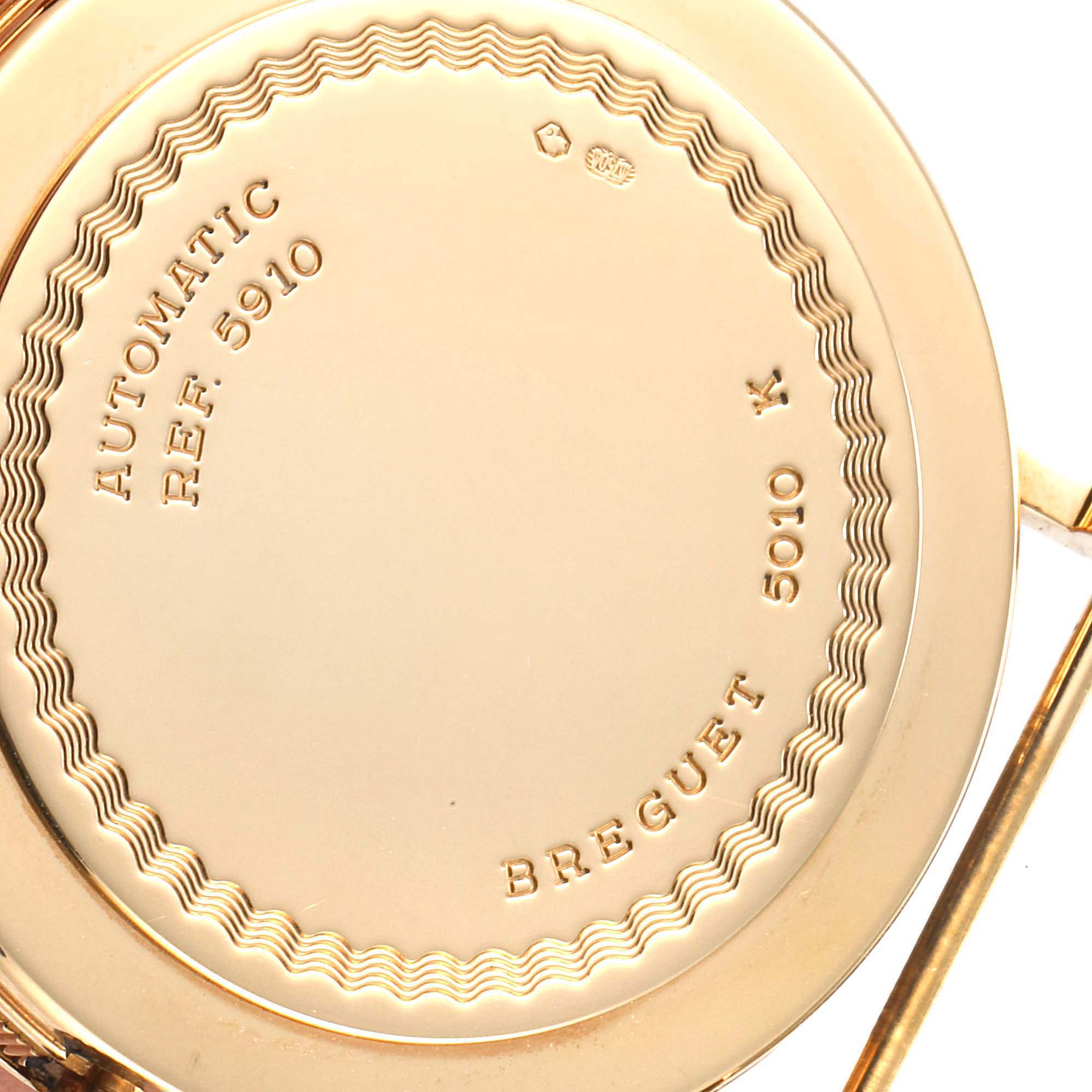 The image shows the back case of the Breguet Classique 3910 Men's Yellow Gold Silver Dial 3910 Men's Yellow Gold Silver Dial model watch, displaying the reference number and brand engravings.