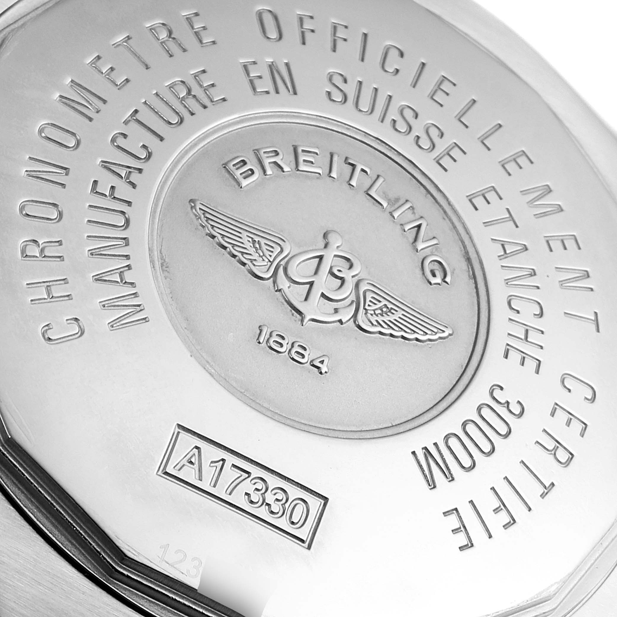 The image shows the back case of the Breitling Avenger A17330 Men's Stainless Steel Yellow Dial A17330 Men's Stainless Steel Yellow Dial watch, highlighting its engravings and model number.