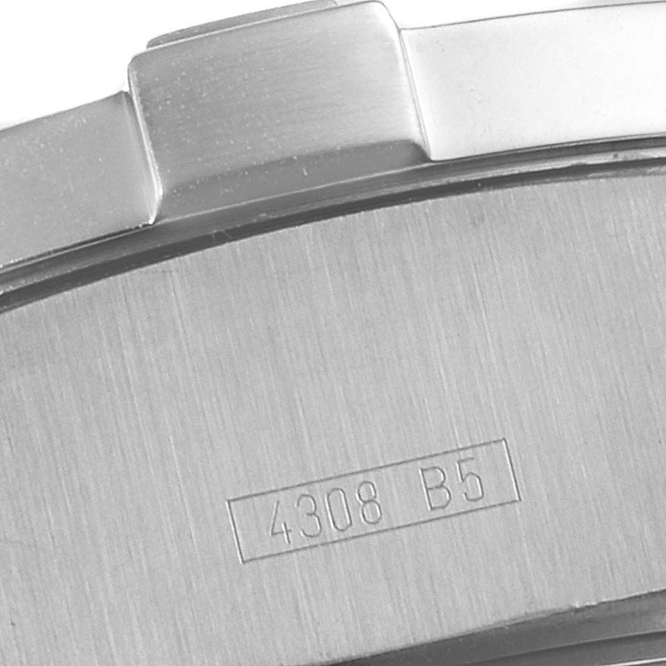 This image shows a close-up of the clasp and part of the bracelet with engravings on a Breitling Avenger A17330 Men's Stainless Steel Yellow Dial A17330 Men's Stainless Steel Yellow Dial watch.