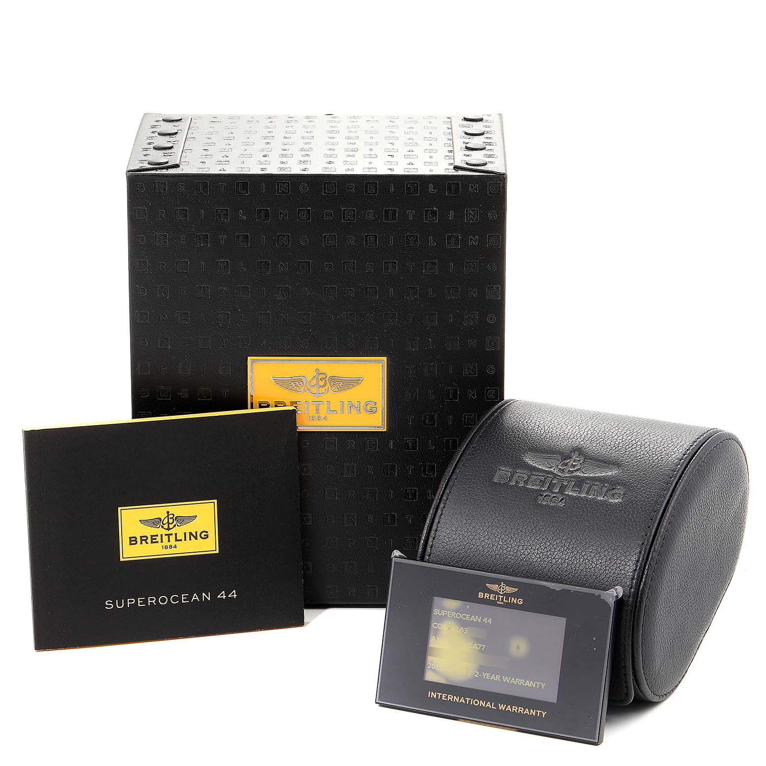 The image shows the packaging, manual, warranty card, and watch case for a Breitling Superocean A17391 Men
s Stainless Steel Black Dial A17391 Men
s Stainless Steel Black Dial 44 watch.