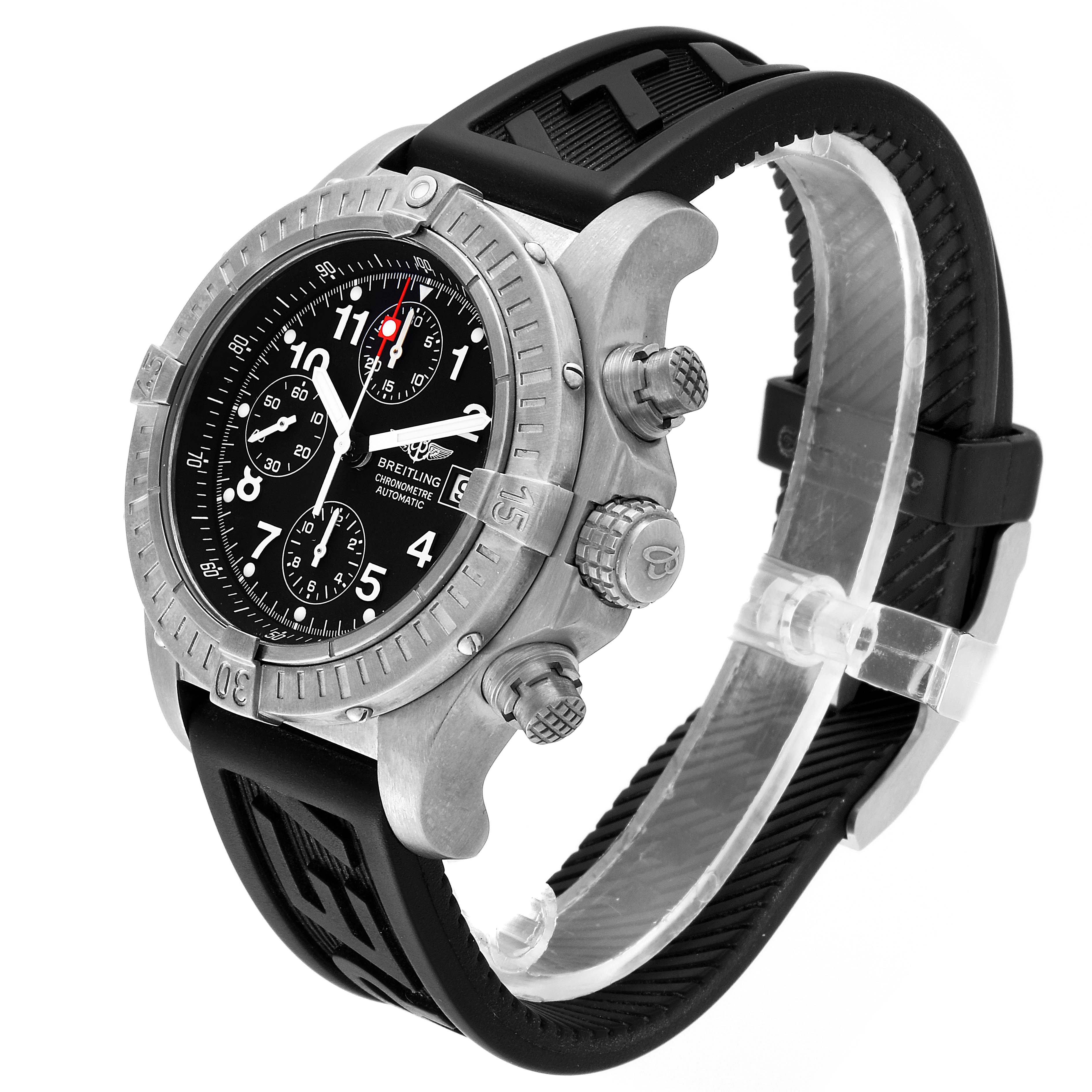The Breitling Avenger E13360 Men's Titanium Black Dial E13360 Men's Titanium Black Dial watch is shown from an angled side view, highlighting the chronograph dials, bezel, and rubber strap.