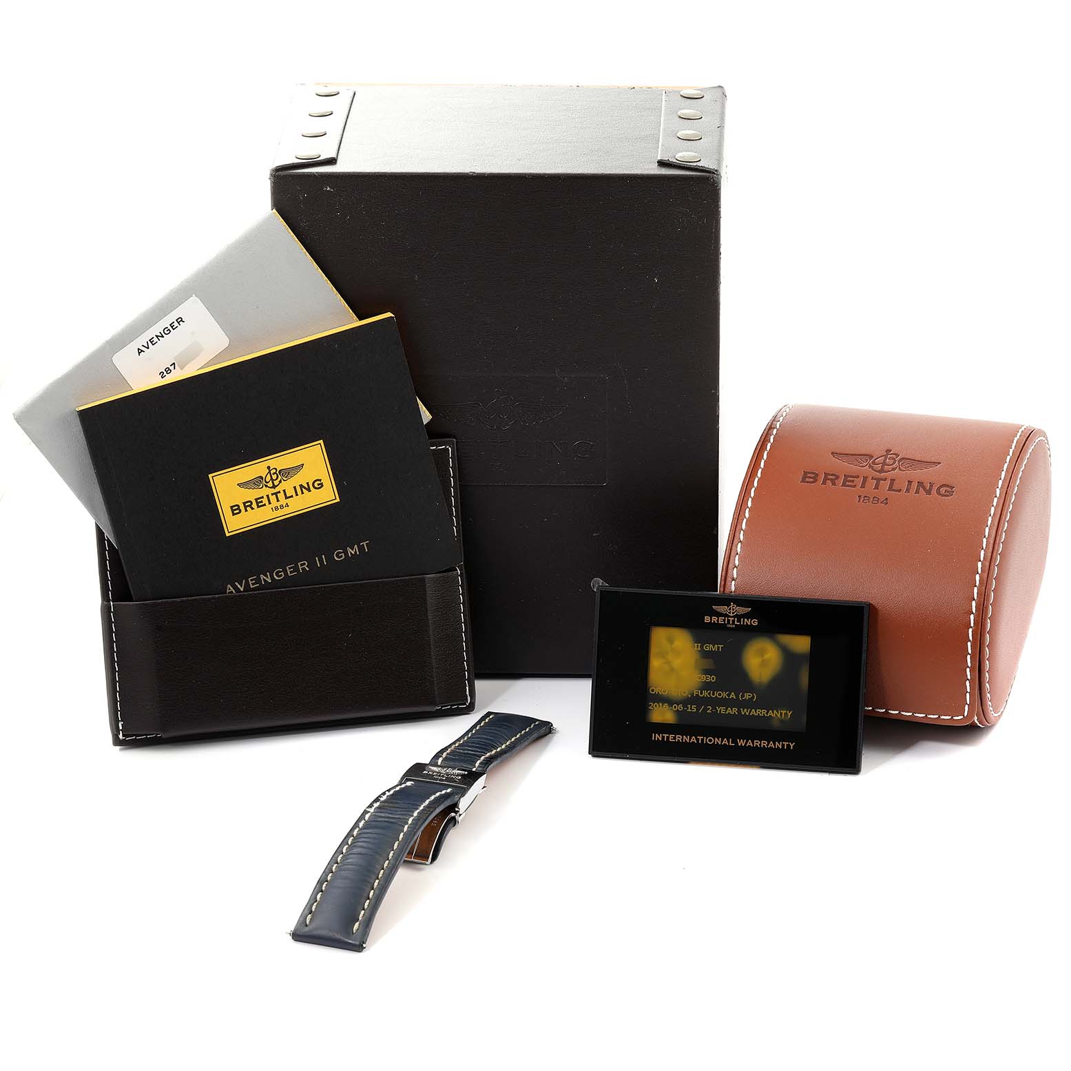 The image shows the Breitling Avenger A3239011-C872-170A Men's Stainless Steel Mother of Pearl Dial A3239011-C872-170A Men's Stainless Steel Mother of Pearl Dial II GMT watch accessories, including a box, warranty card, manual, and a strap.