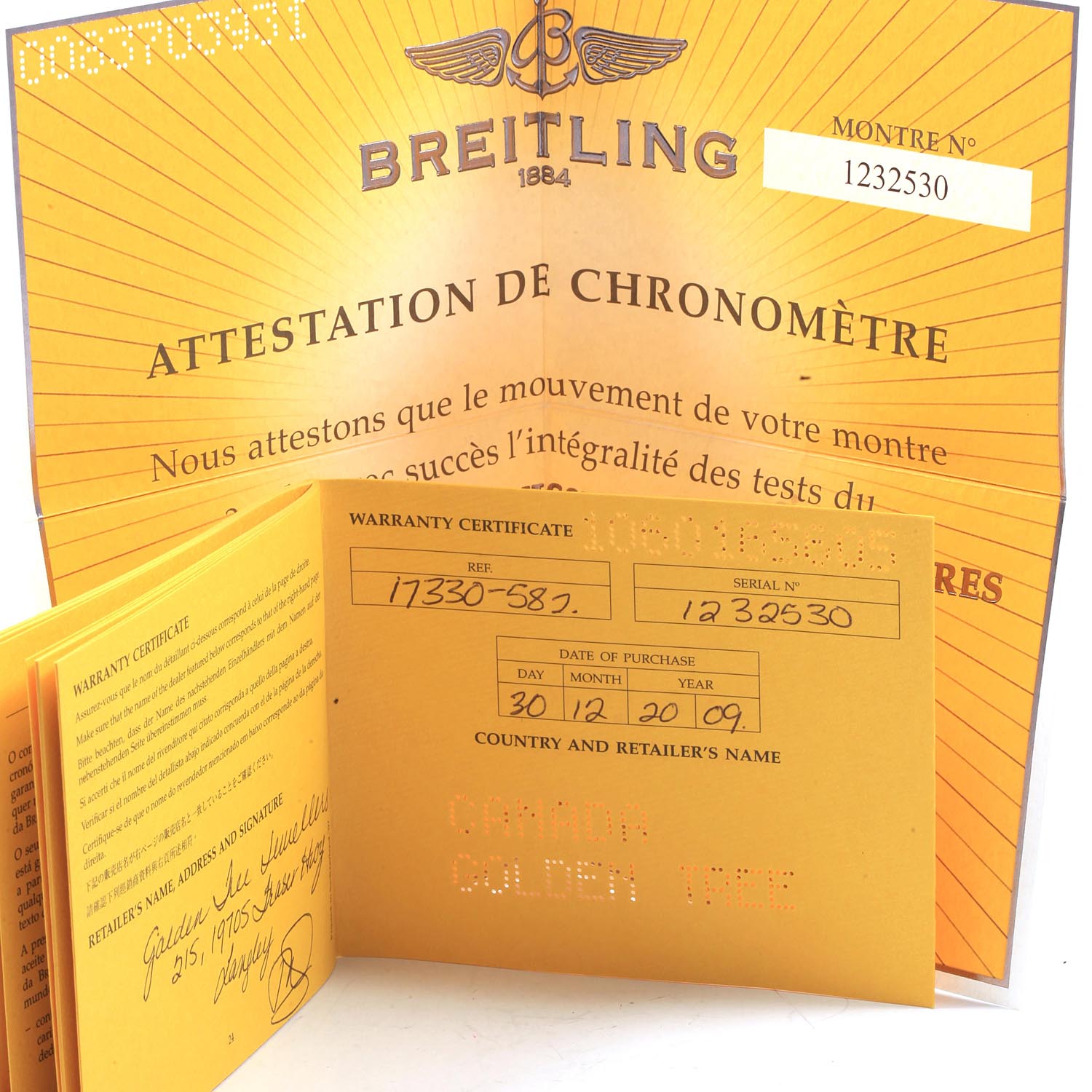 The image shows the warranty certificate and chronometer attestation documents for a Breitling Avenger A17330 Men's Stainless Steel Yellow Dial A17330 Men's Stainless Steel Yellow Dial watch.