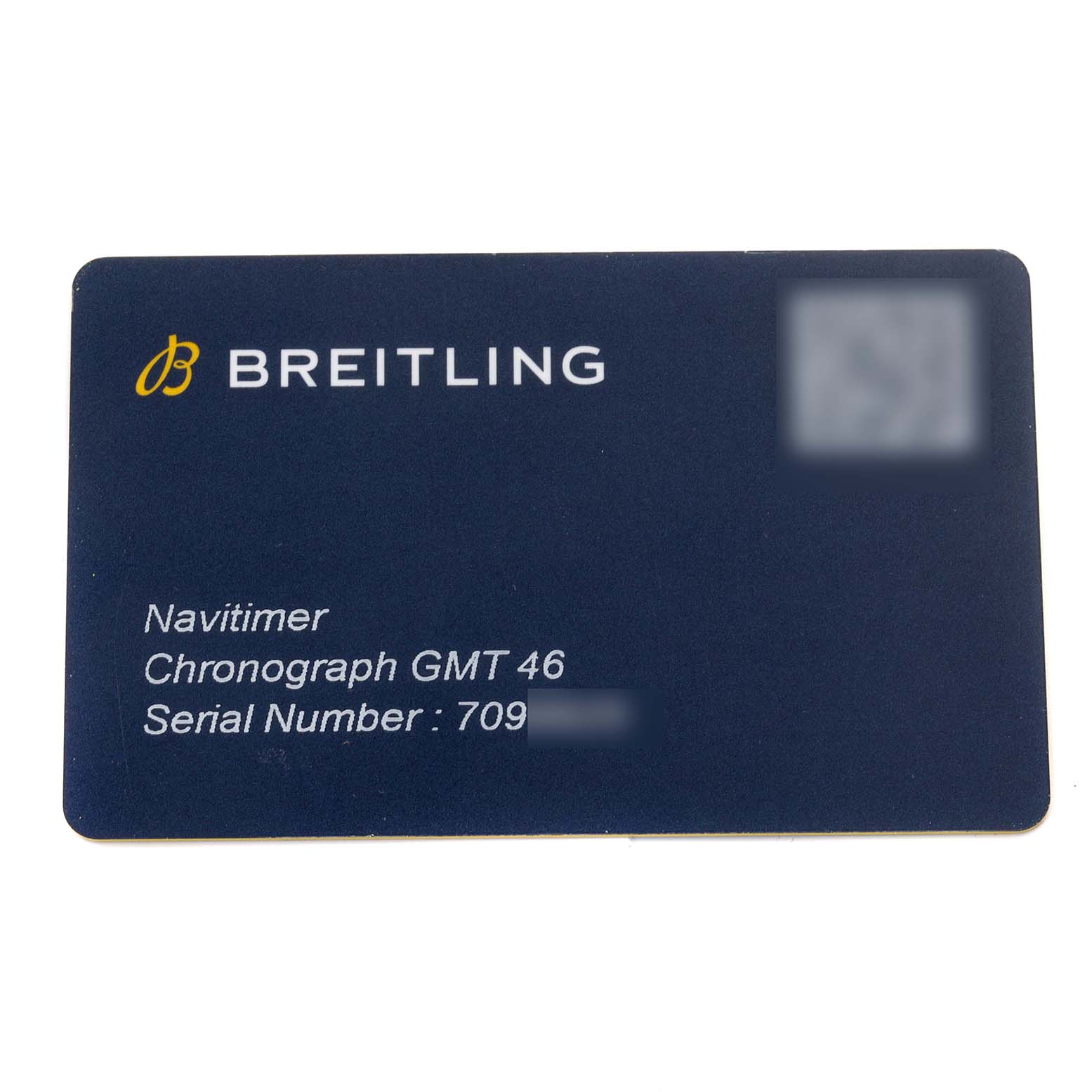 This image shows a close-up of a Breitling Navitimer A24322 Men
s Stainless Steel Blue Dial A24322 Men
s Stainless Steel Blue Dial Chronograph GMT 46 identification card.