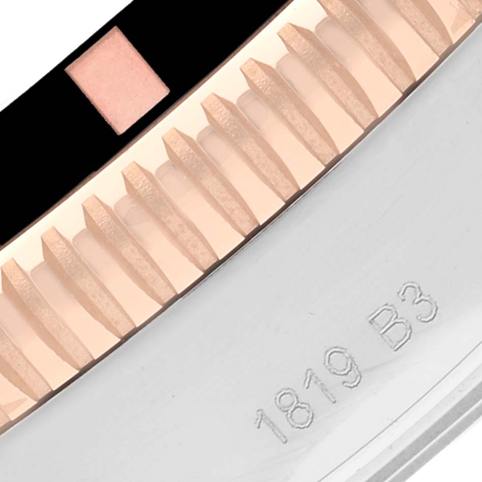 This close-up image shows part of the bezel with markings on the side of a Breitling Superocean UB2030121B1A1 Men's Stainless Steel Black Dial UB2030121B1A1 Men's Stainless Steel Black Dial watch.