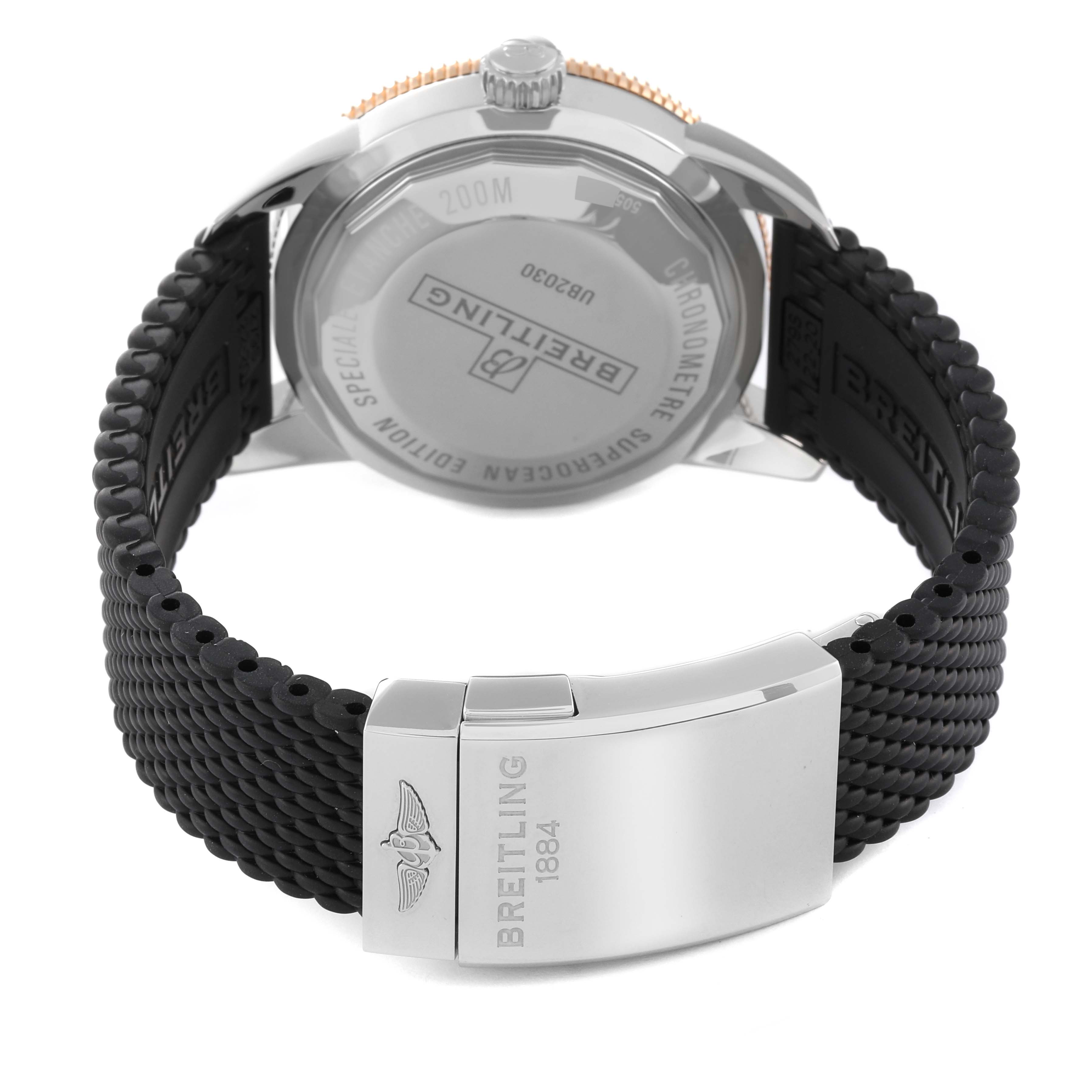 The image shows the back case and strap of a Breitling Superocean UB2030121B1A1 Men's Stainless Steel Black Dial UB2030121B1A1 Men's Stainless Steel Black Dial watch, with a focus on the clasp and engraving.