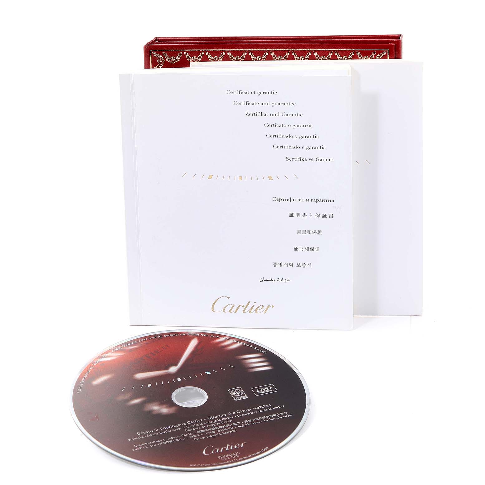 The image shows the certificates, guarantee documents, and a DVD for the Calibre de Cartier model by Cartier.