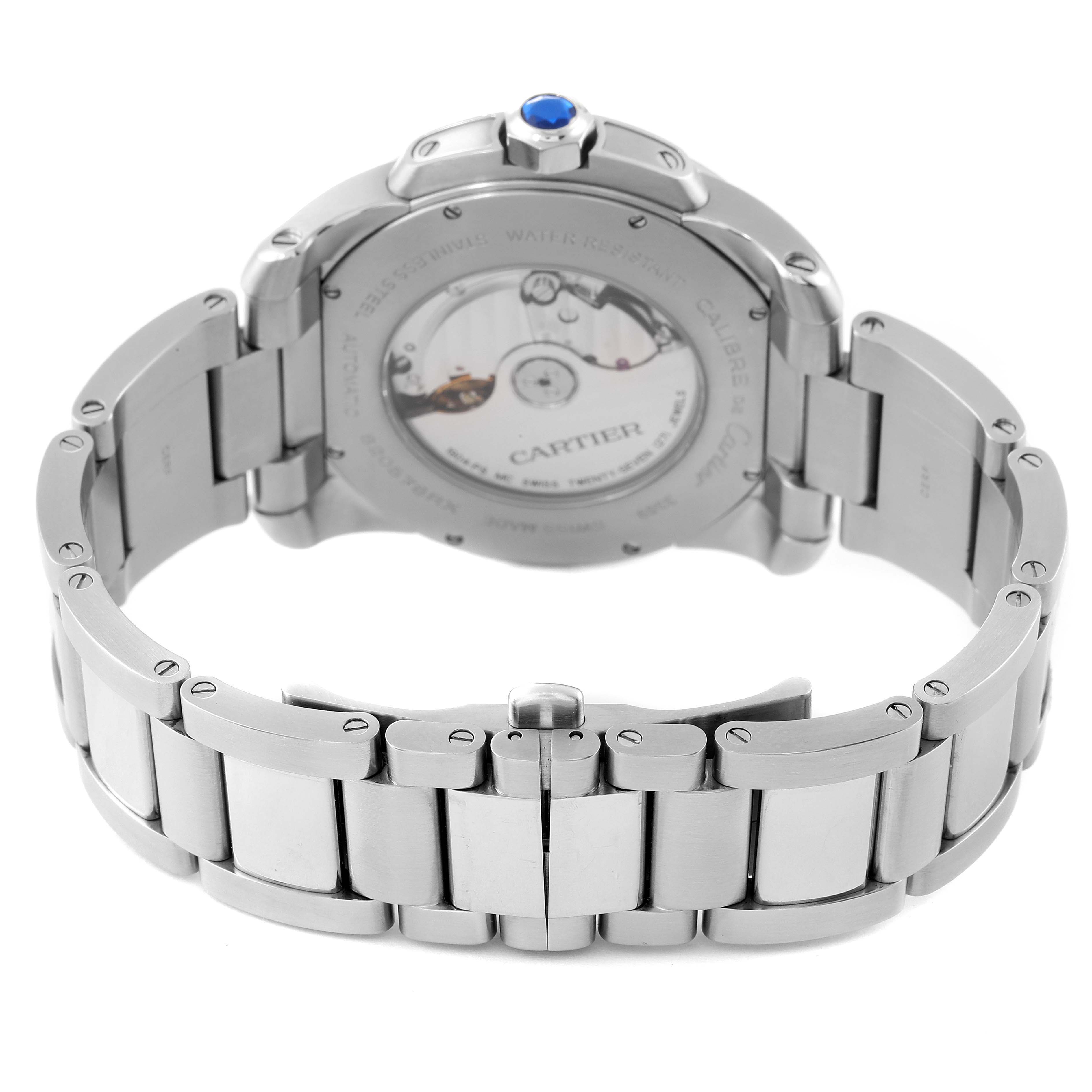 The image shows the back view of the Calibre de Cartier watch by Cartier, displaying the bracelet and case back.