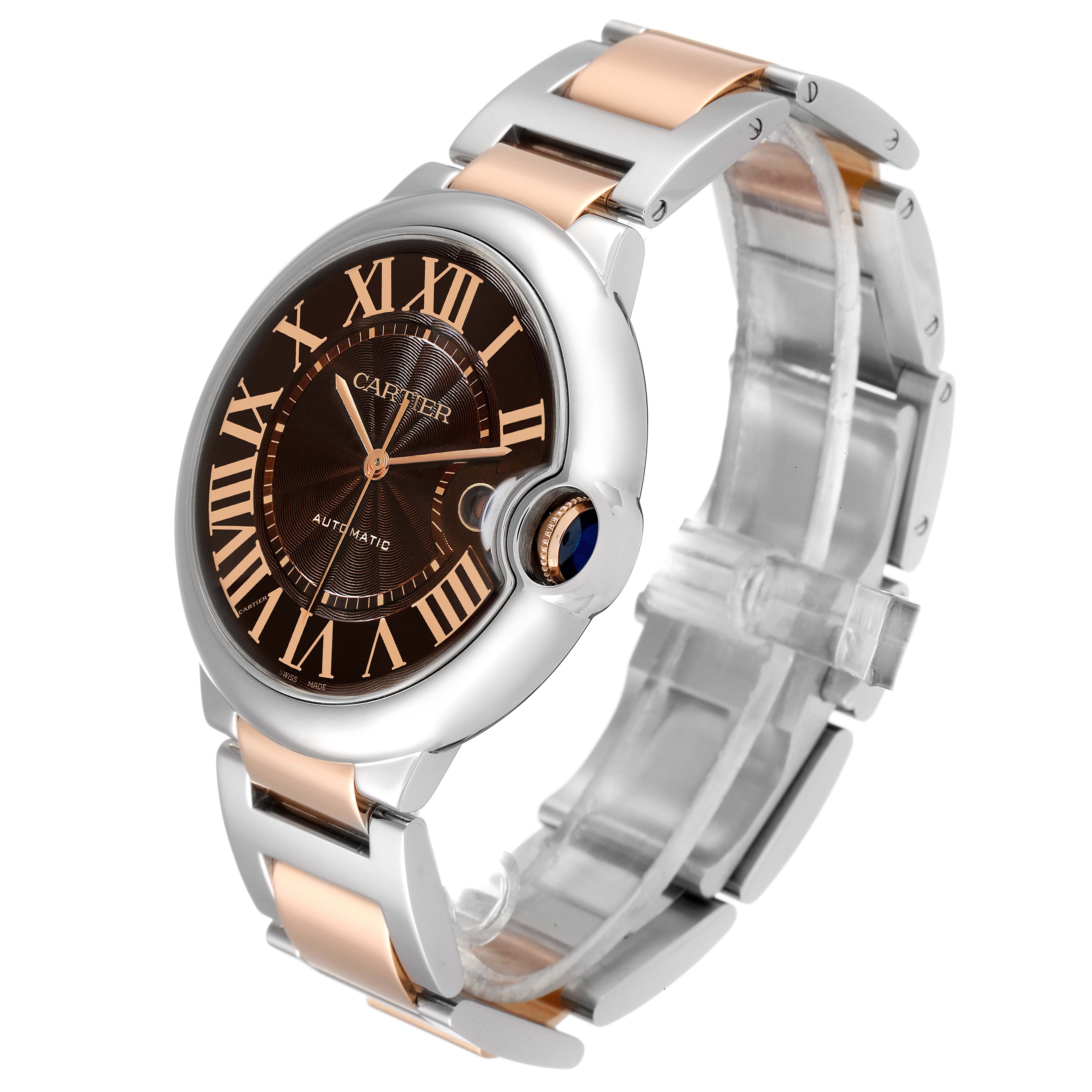 This image shows a Cartier Ballon Bleu W6920032 Men's Steel and Gold (two tone) Brown Dial W6920032 Men's Steel and Gold (two tone) Brown Dial watch at a three-quarter angle, highlighting the face, crown, and two-tone band.