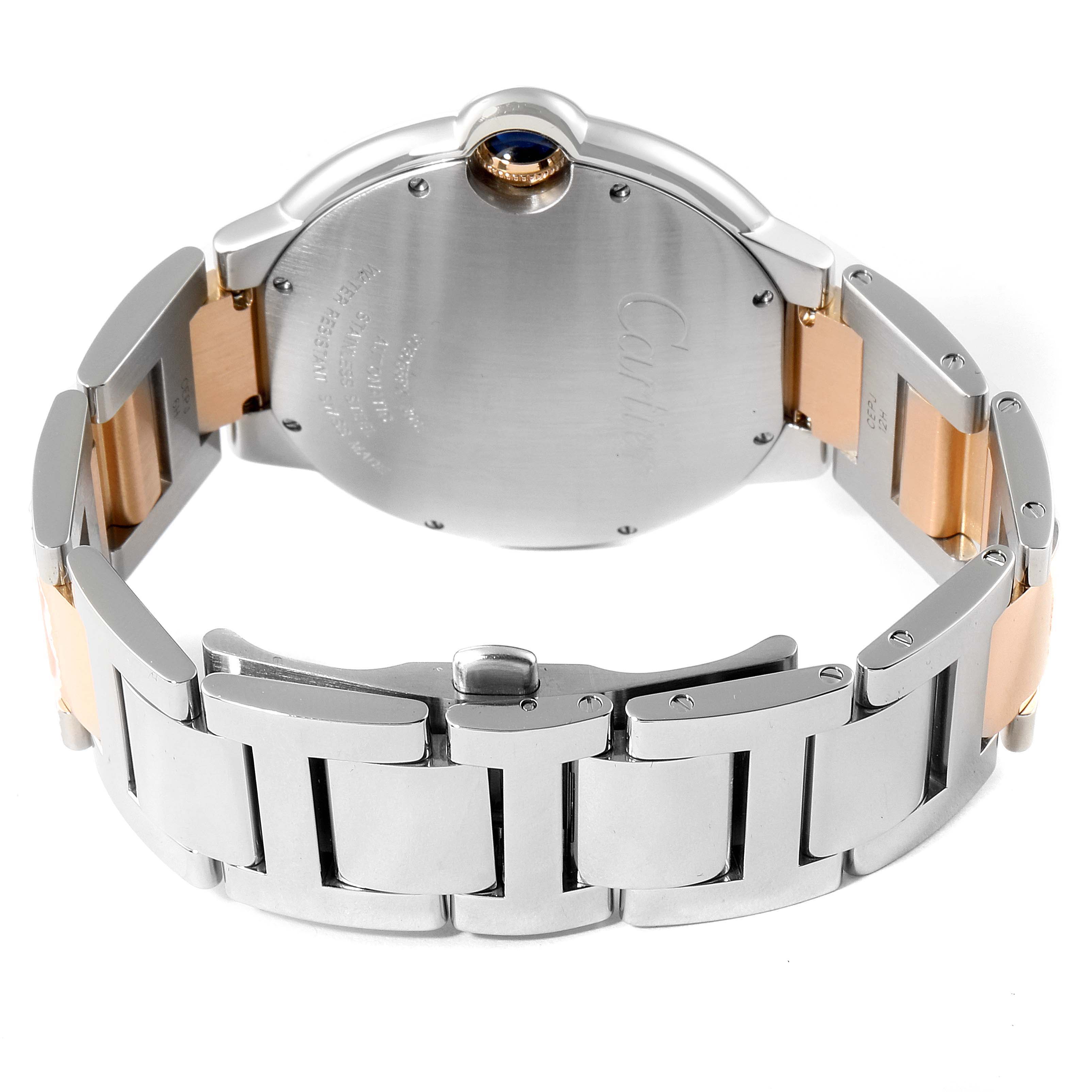 The image shows the back and partial sides of a Ballon Bleu by Cartier wristwatch, focusing on the bracelet and caseback.