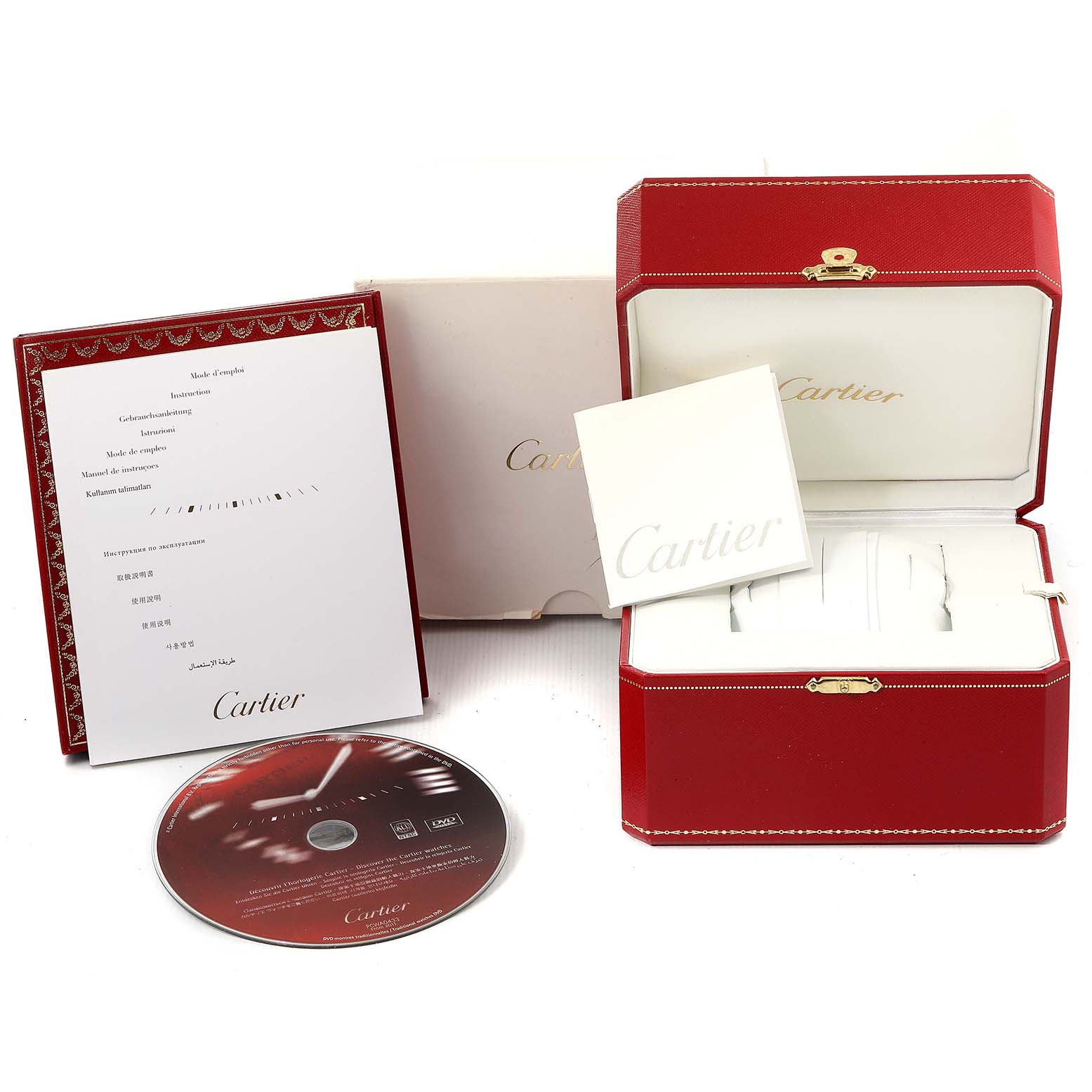 The image shows the packaging and accessories of the Santos model by Cartier, including the box, manual, and a CD.