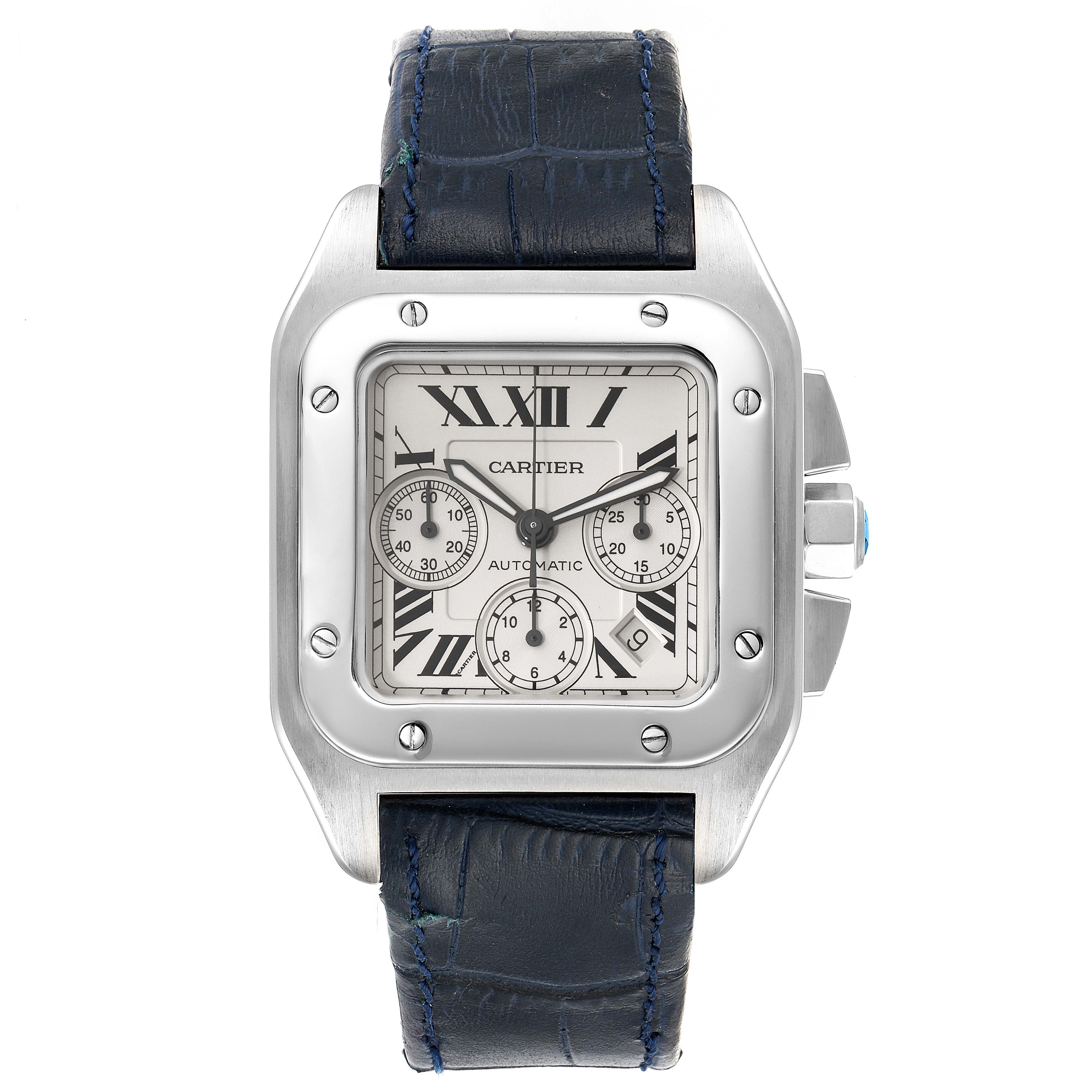 The Cartier Santos W20090X8 Men
s Stainless Steel Silver Dial W20090X8 Men
s Stainless Steel Silver Dial watch is shown from a front angle, displaying its face, Roman numerals, and leather strap.