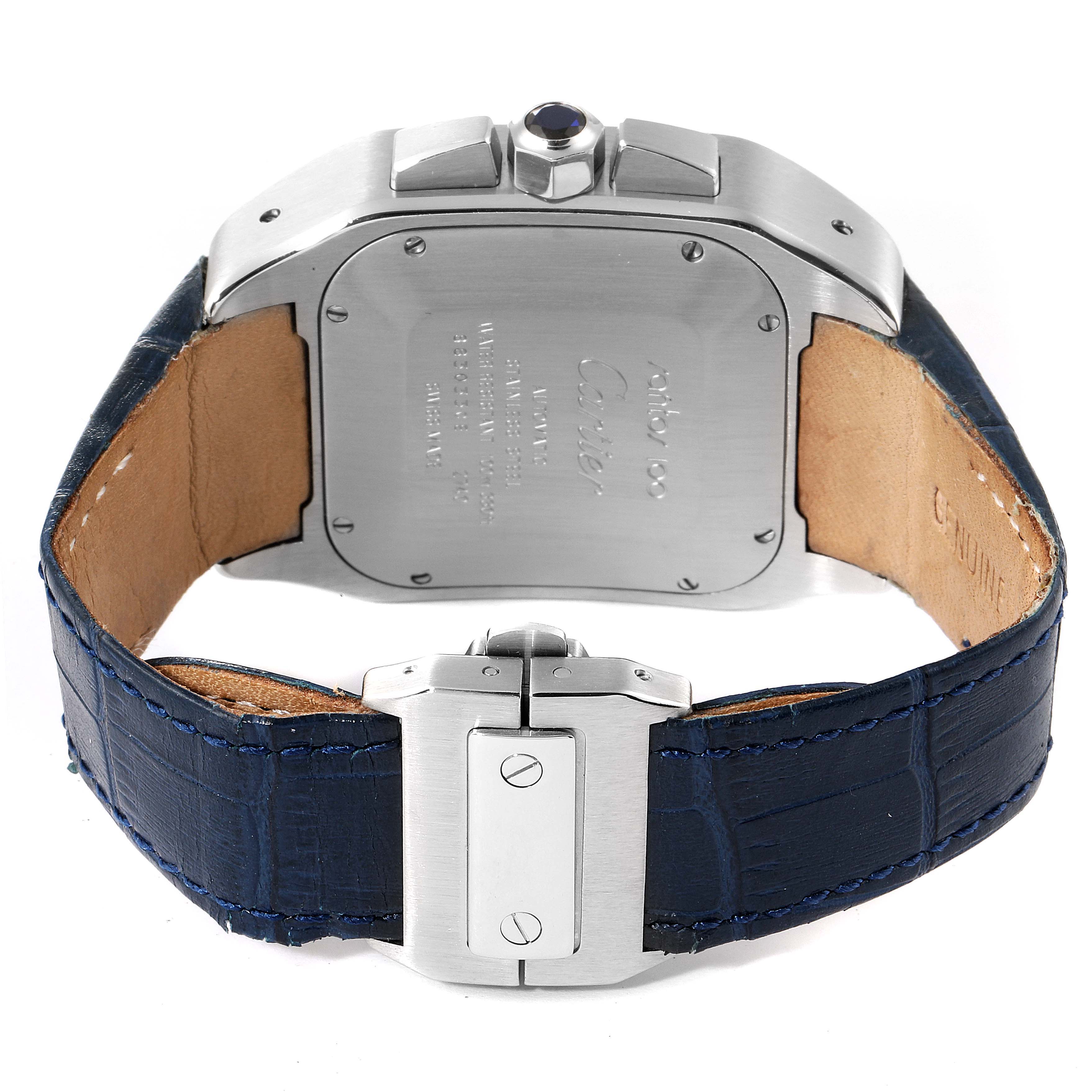 The image shows the back view of a Cartier Santos W20090X8 Men
s Stainless Steel Silver Dial W20090X8 Men
s Stainless Steel Silver Dial watch, featuring the case back and the blue leather strap with clasp.