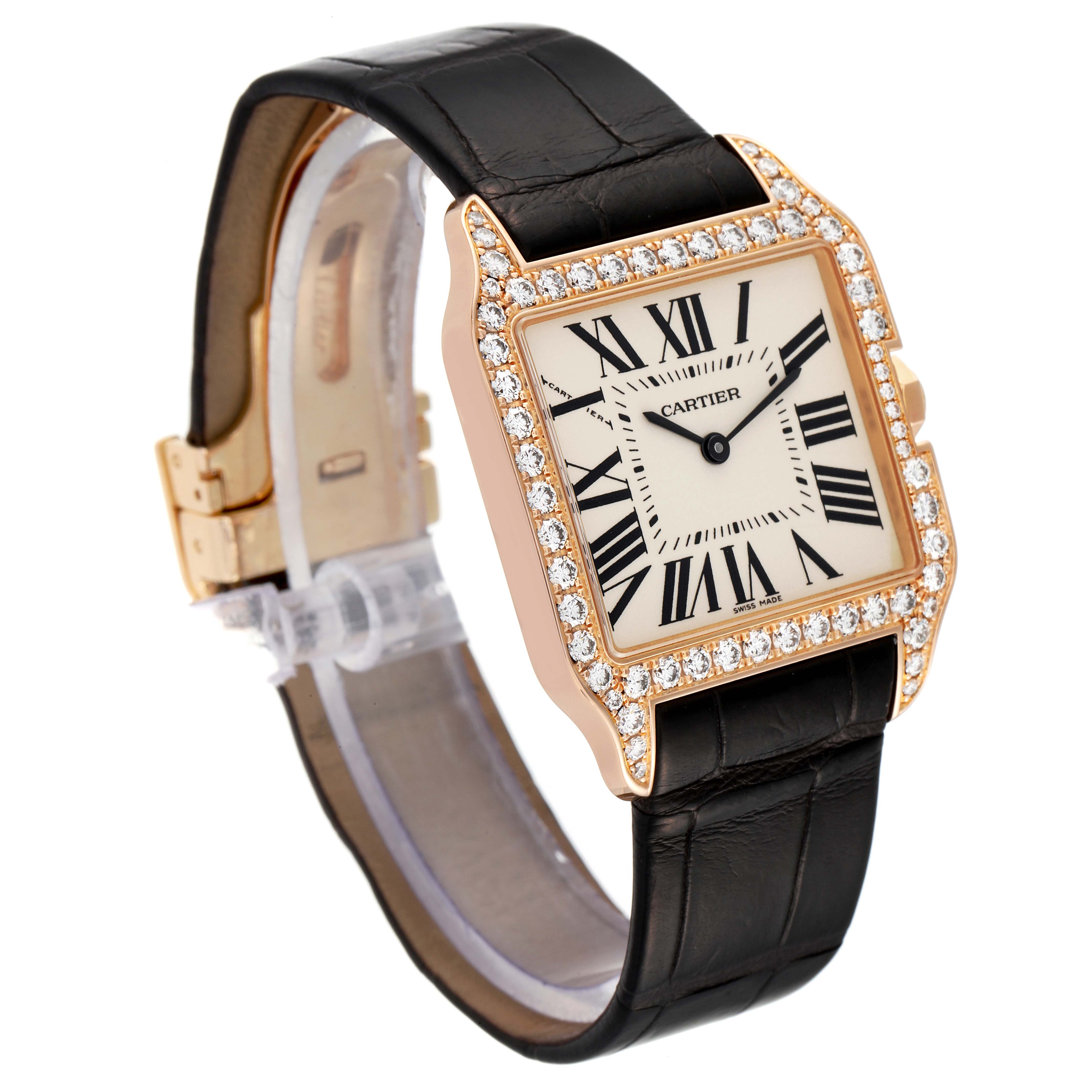 This image shows a Cartier Santos Dumont WH100351 Men's Rose Gold Silver Dial WH100351 Men's Rose Gold Silver Dial watch at a three-quarter angle, showcasing its diamond-encrusted bezel and black leather strap.