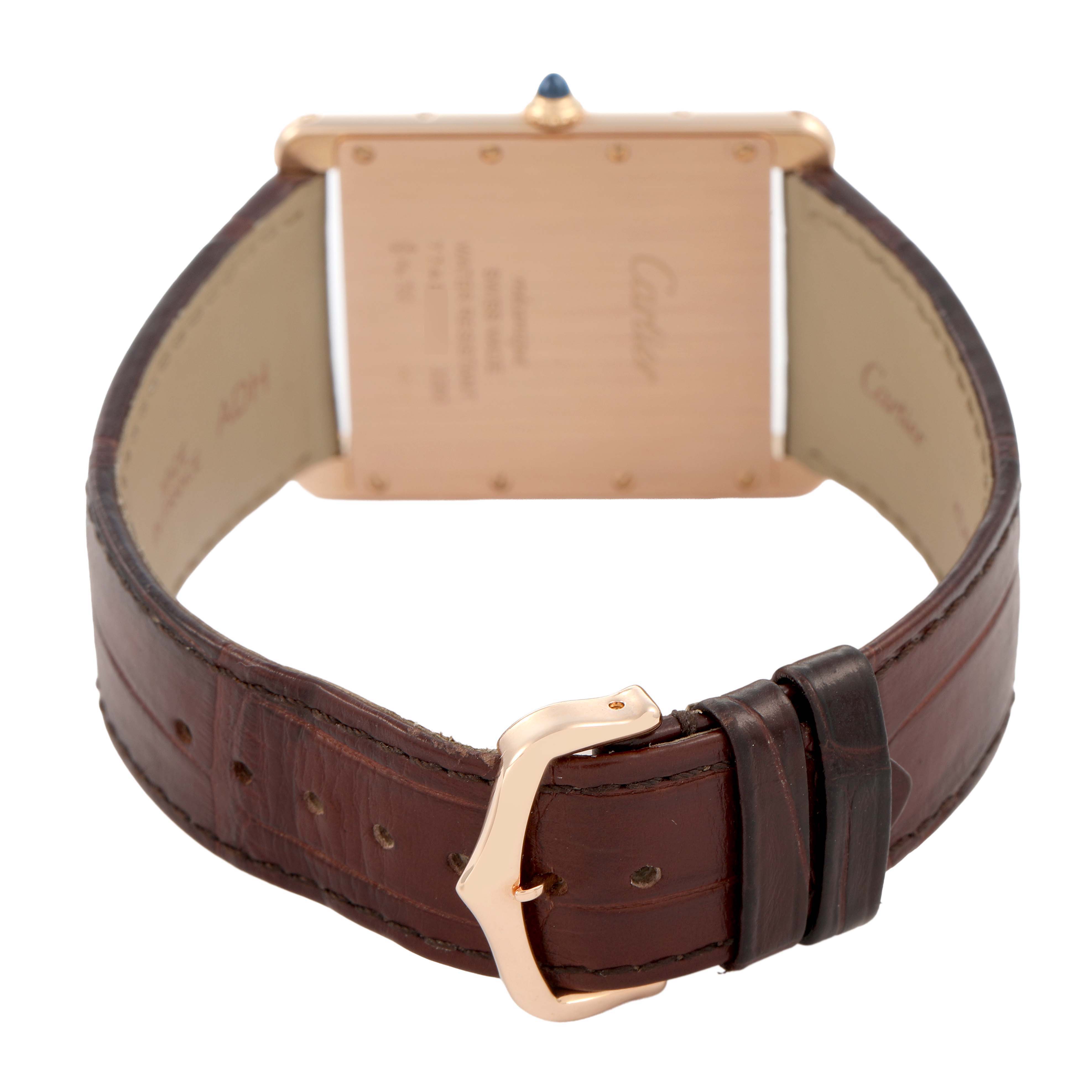 The image shows the back of a Cartier Tank Louis W1560017 Men's Rose Gold Silver Dial watch, highlighting its case back, brown leather strap, and buckle.