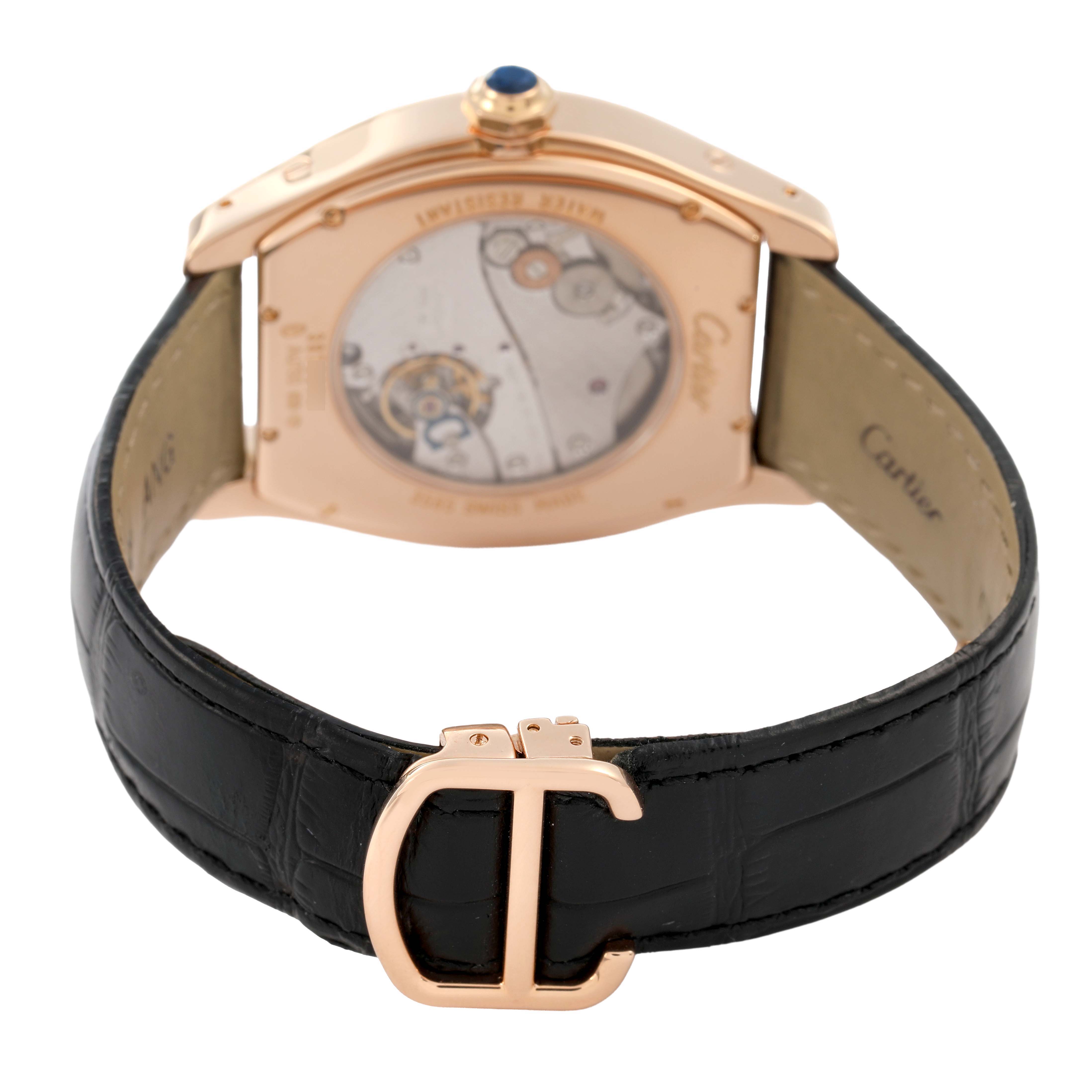 The Cartier Tortue W1556324 Men's Rose Gold Silver Dial watch is shown from the back, highlighting the case back, movement, black strap, and clasp.
