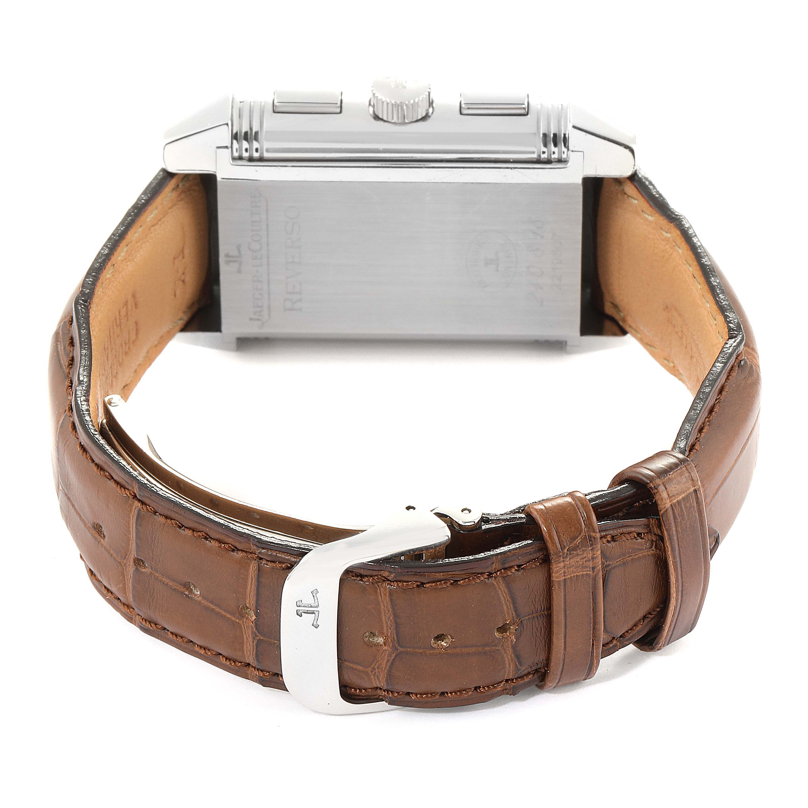 This image shows the back case, crown, side buttons, and strap of the Jaeger-LeCoultre Reverso watch from a rear angle.