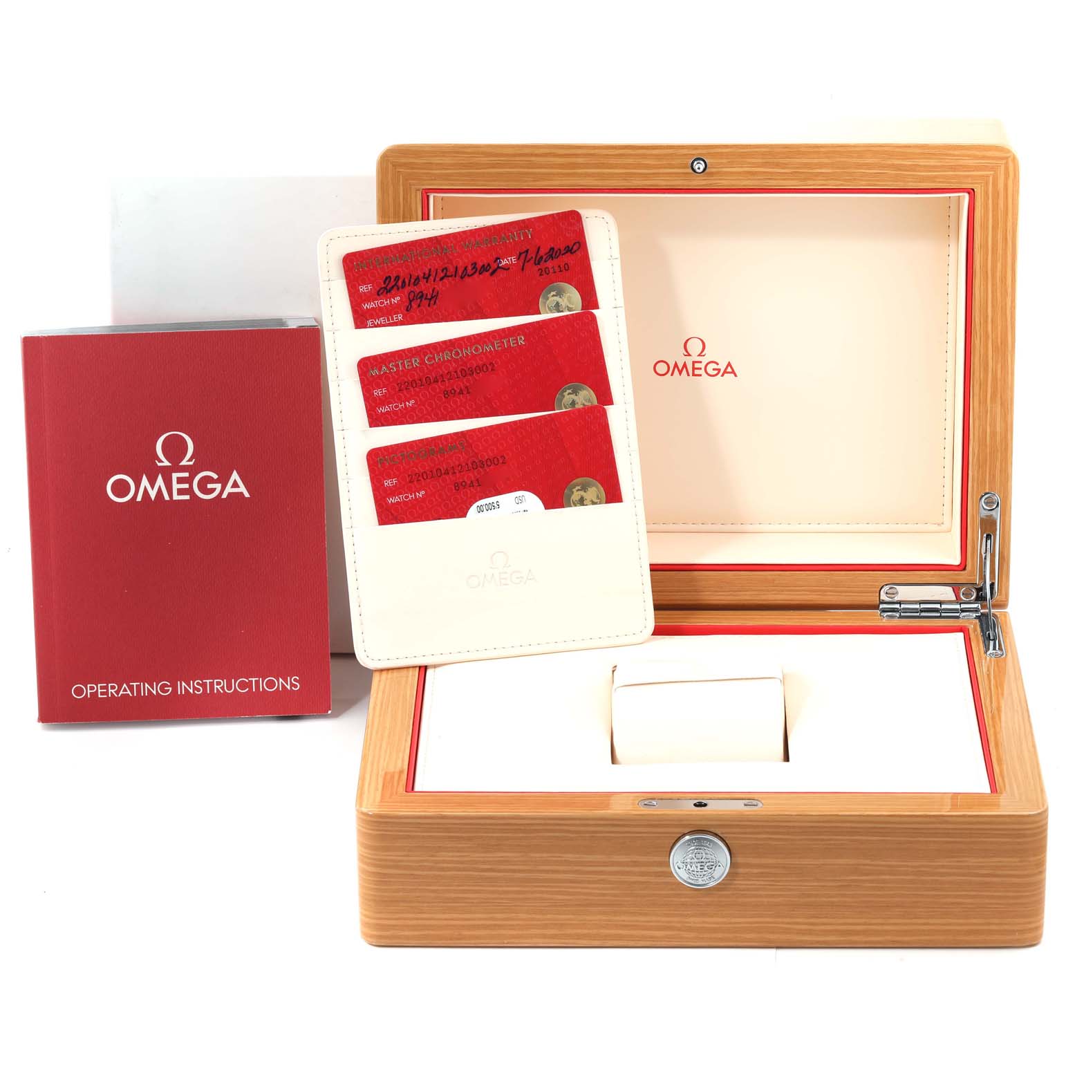 This image shows an Omega Aqua Terra 220.10.41.21.03.002 Men's Stainless Steel Blue Dial 220.10.41.21.03.002 Men's Stainless Steel Blue Dial watch box, operating instructions, and warranty cards at a front angle.