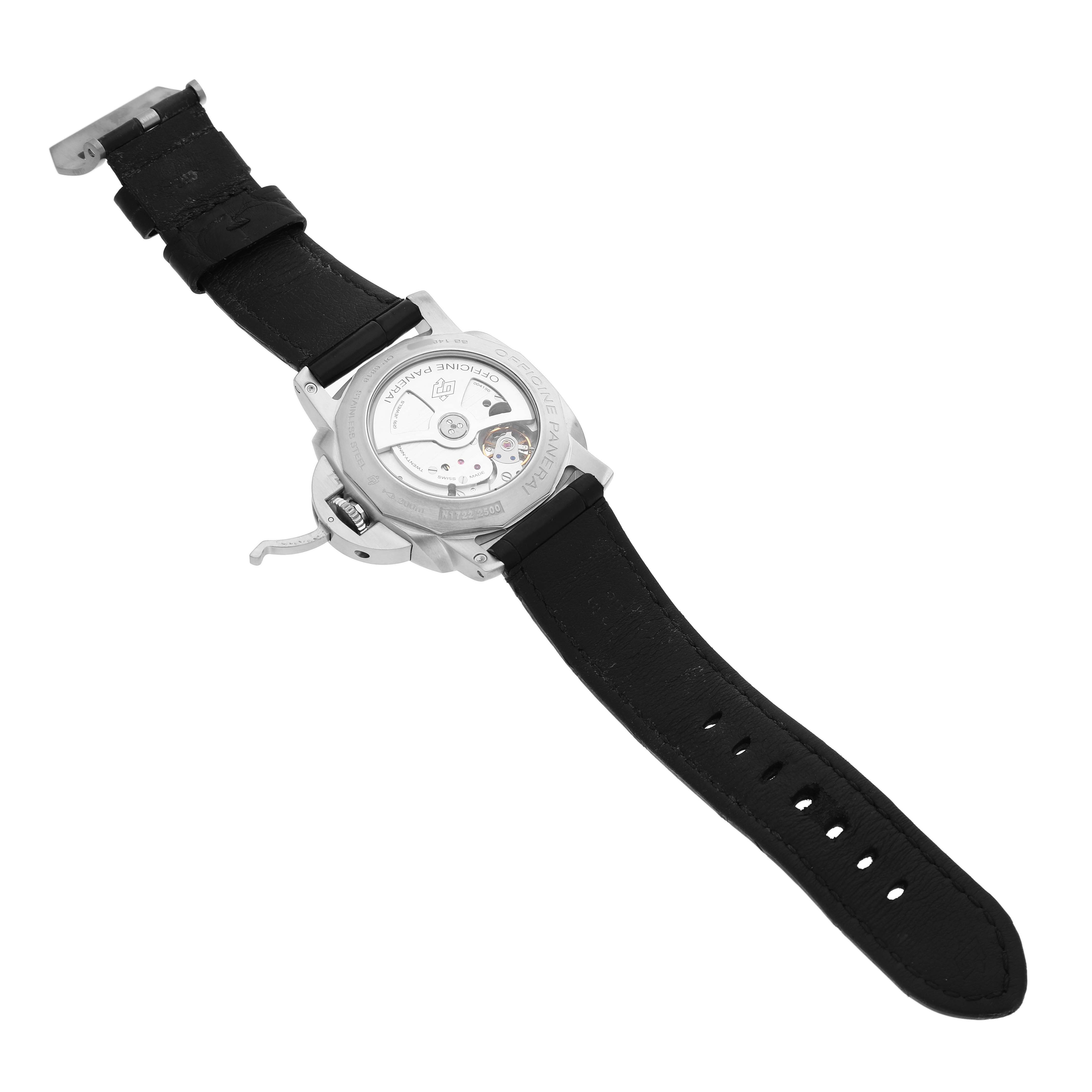The Panerai Luminor PAM00321 Men's Stainless Steel Black Dial watch is shown from a rear angle, highlighting its transparent case back and black strap.