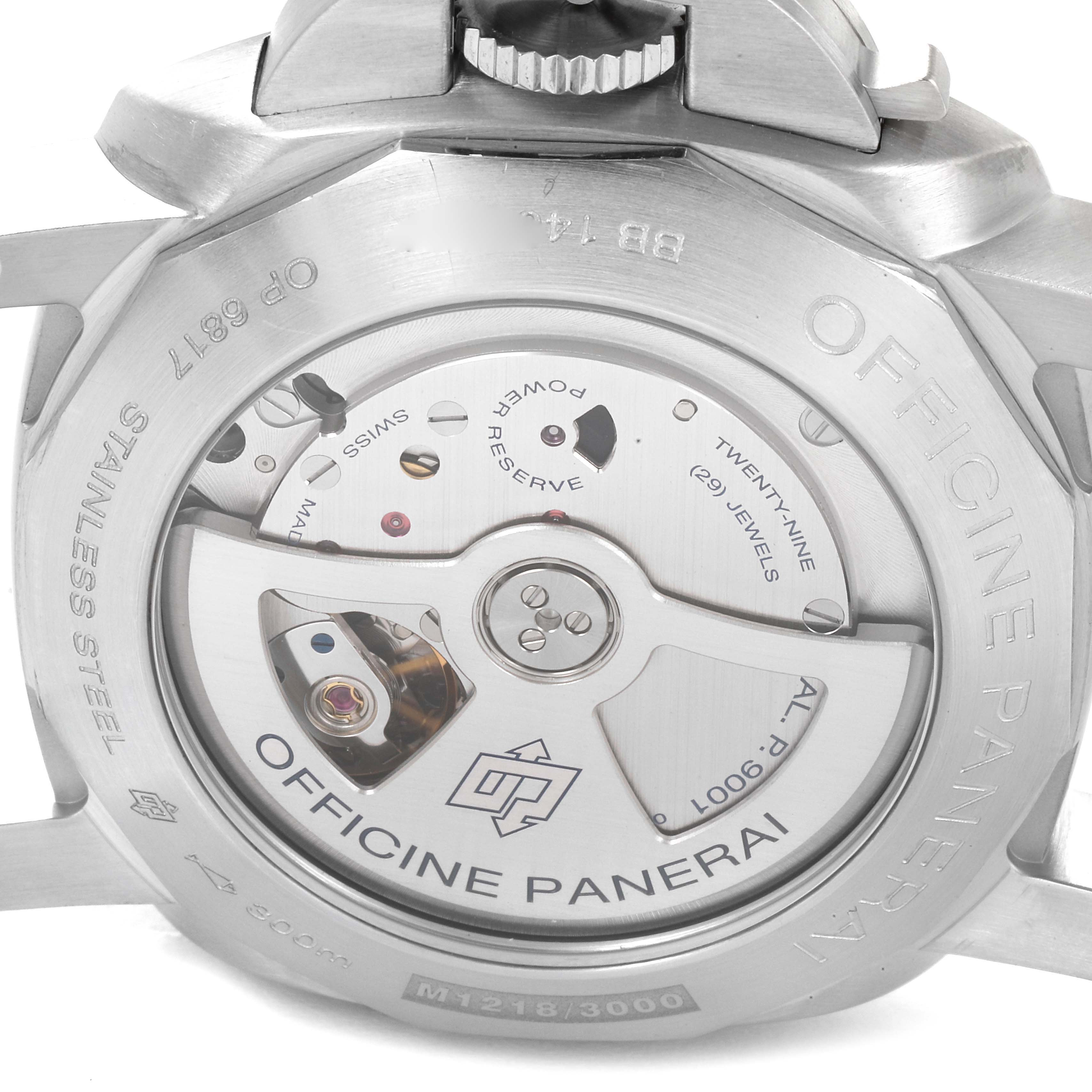The image shows the back view of a Panerai Luminor PAM00320 Men
s Stainless Steel Black Dial PAM00320 Men
s Stainless Steel Black Dial watch, highlighting its mechanical movement and details like "Officine Panerai."