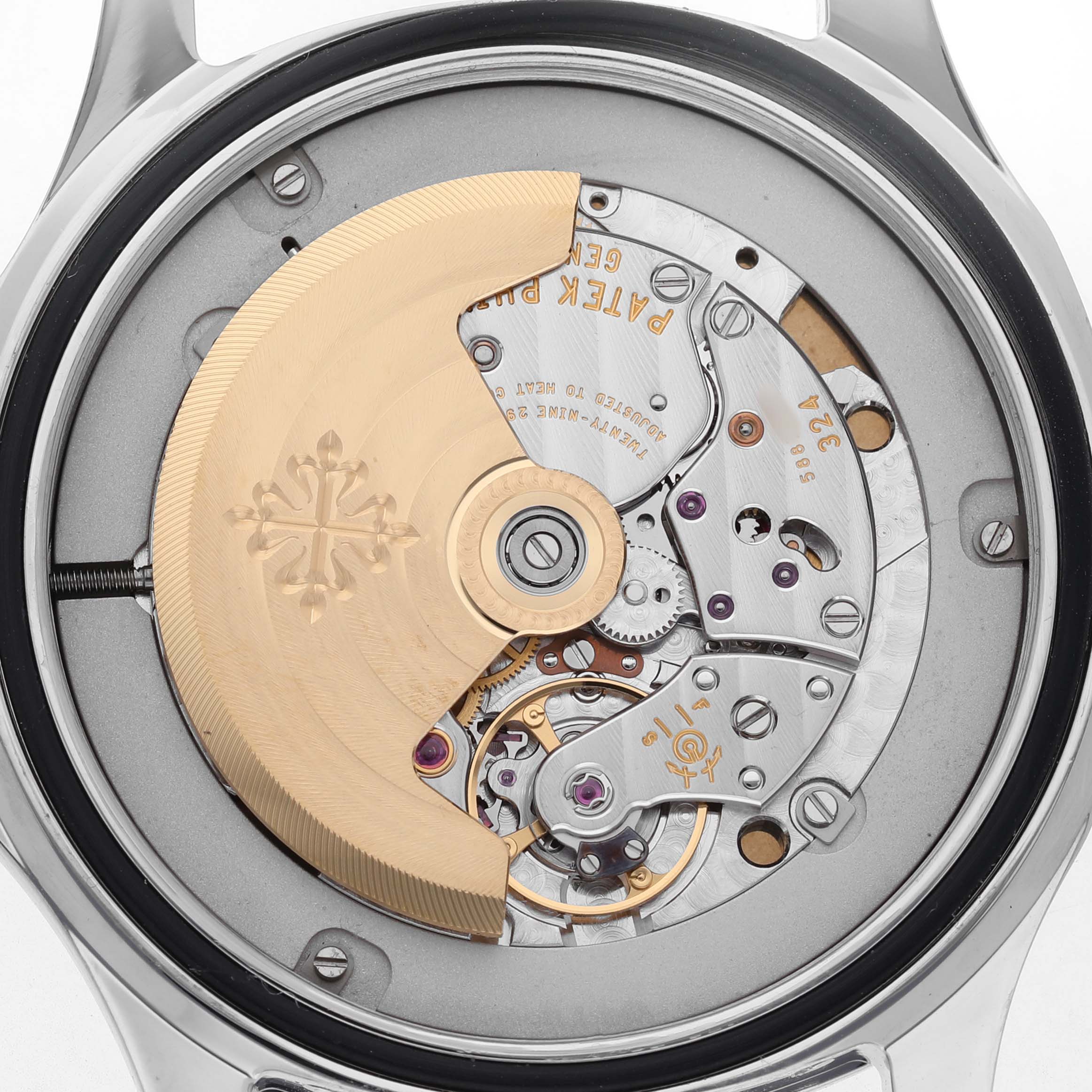 The image shows a detailed view of the movement inside a Patek Philippe Aquanaut 5167A-001 Men's Stainless Steel Grey Dial watch.