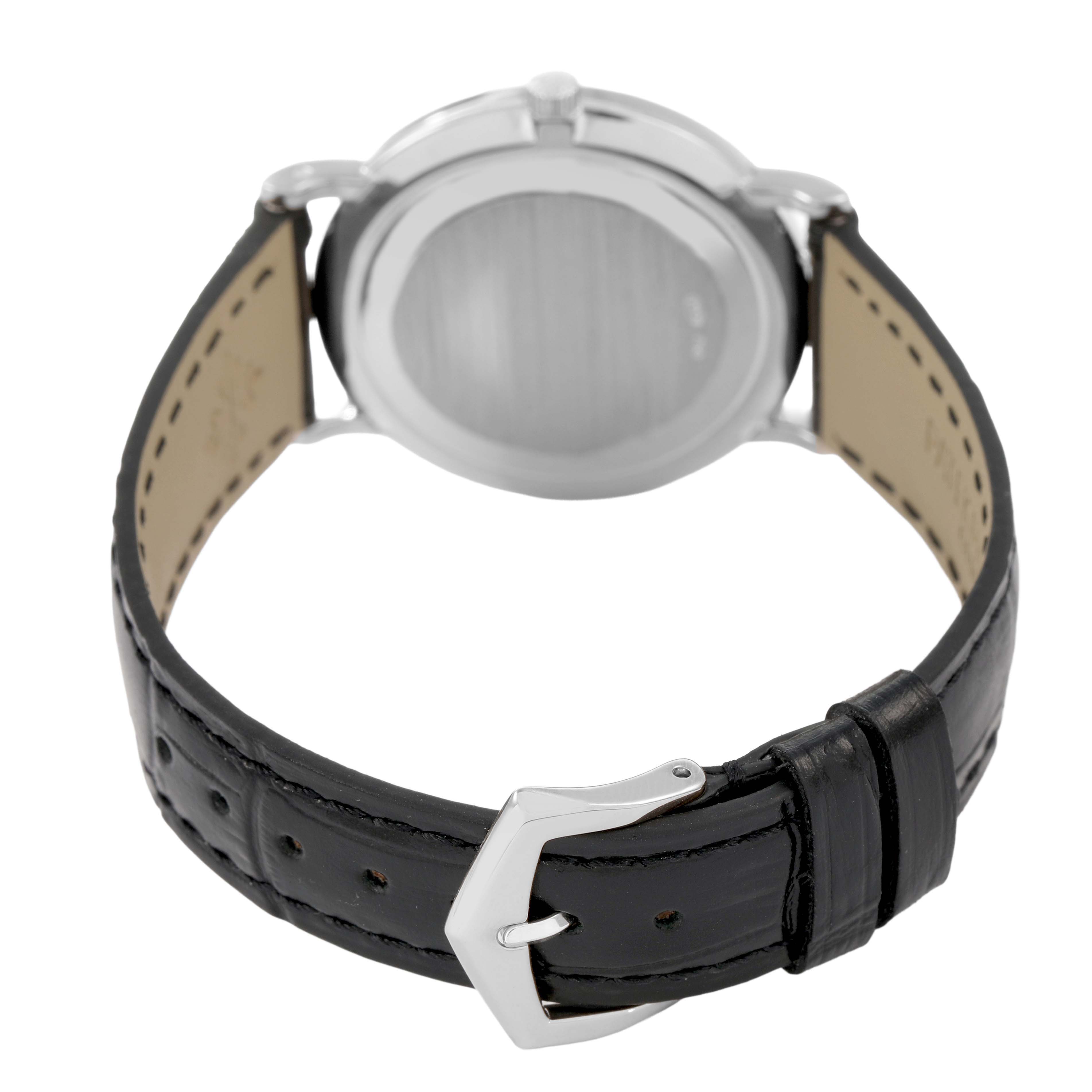 The image shows the back view of a Patek Philippe Calatrava 83323 Men's White Gold White Dial watch, highlighting the clasp, strap, and case back.