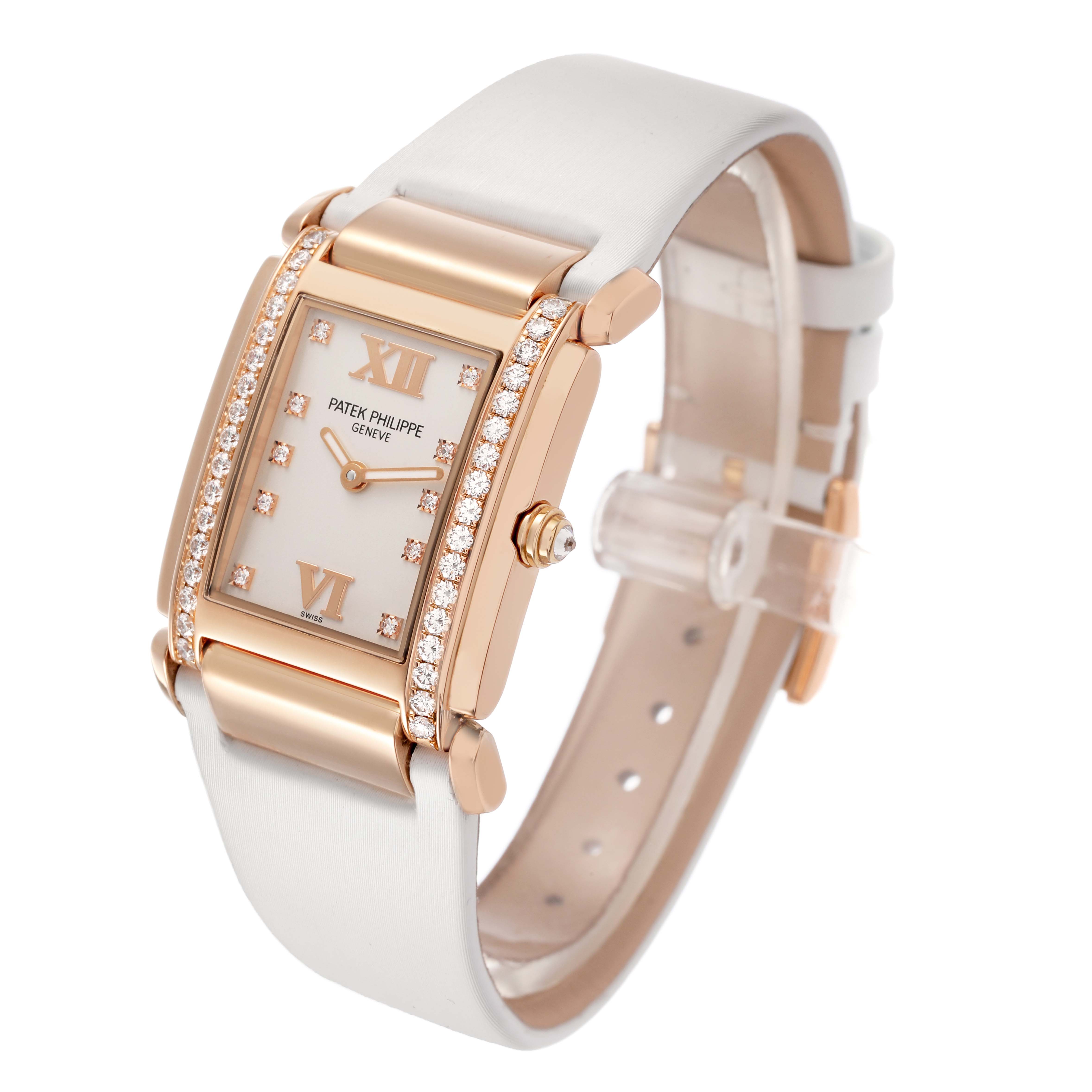 The Patek Philippe Twenty-4 4920R-010 Women's Rose Gold Silver Dial watch is shown at an angled side view, highlighting the dial, diamonds, and strap.