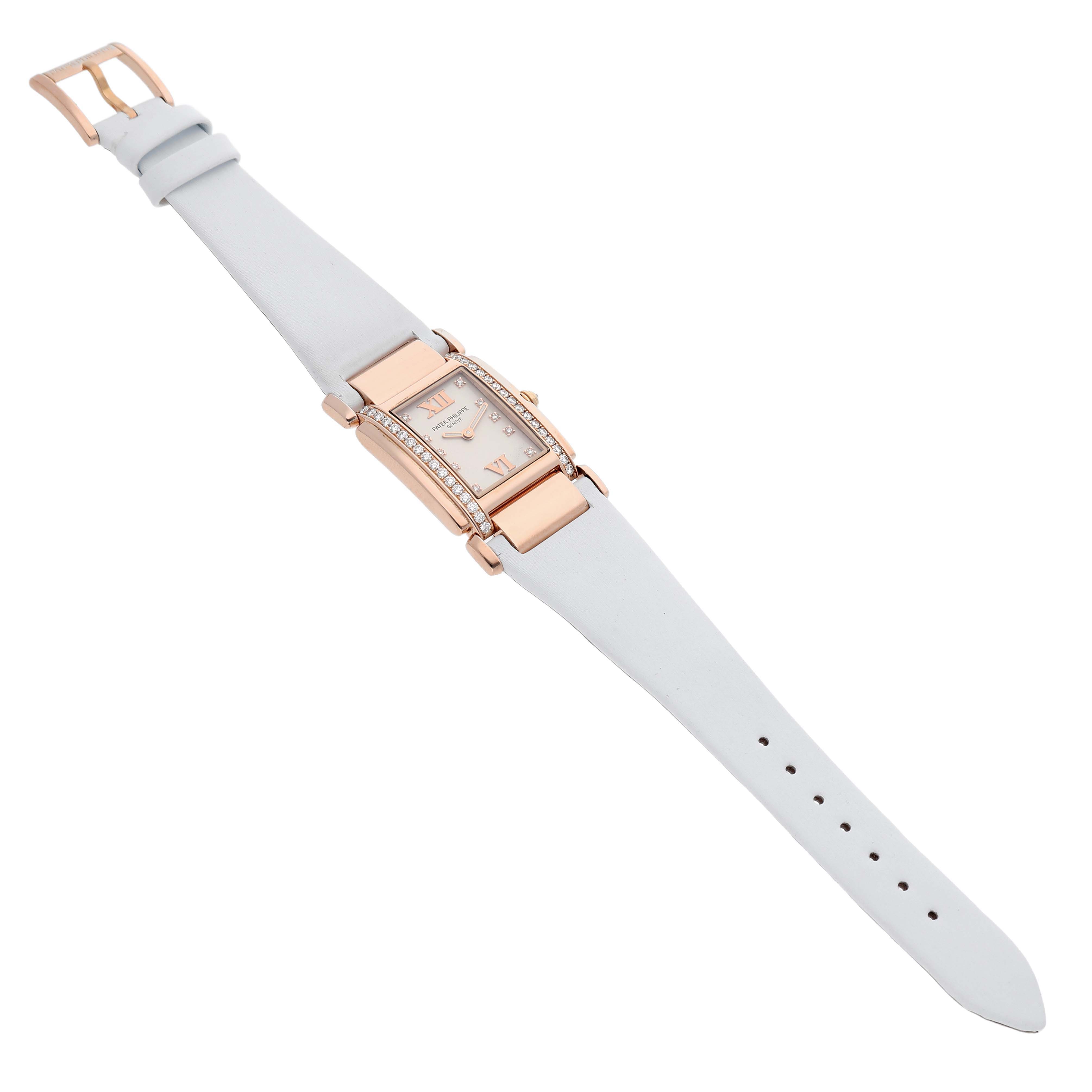 The Patek Philippe Twenty-4 4920R-010 Women's Rose Gold Silver Dial watch is shown at a slight angle, displaying the face, strap, and buckle.