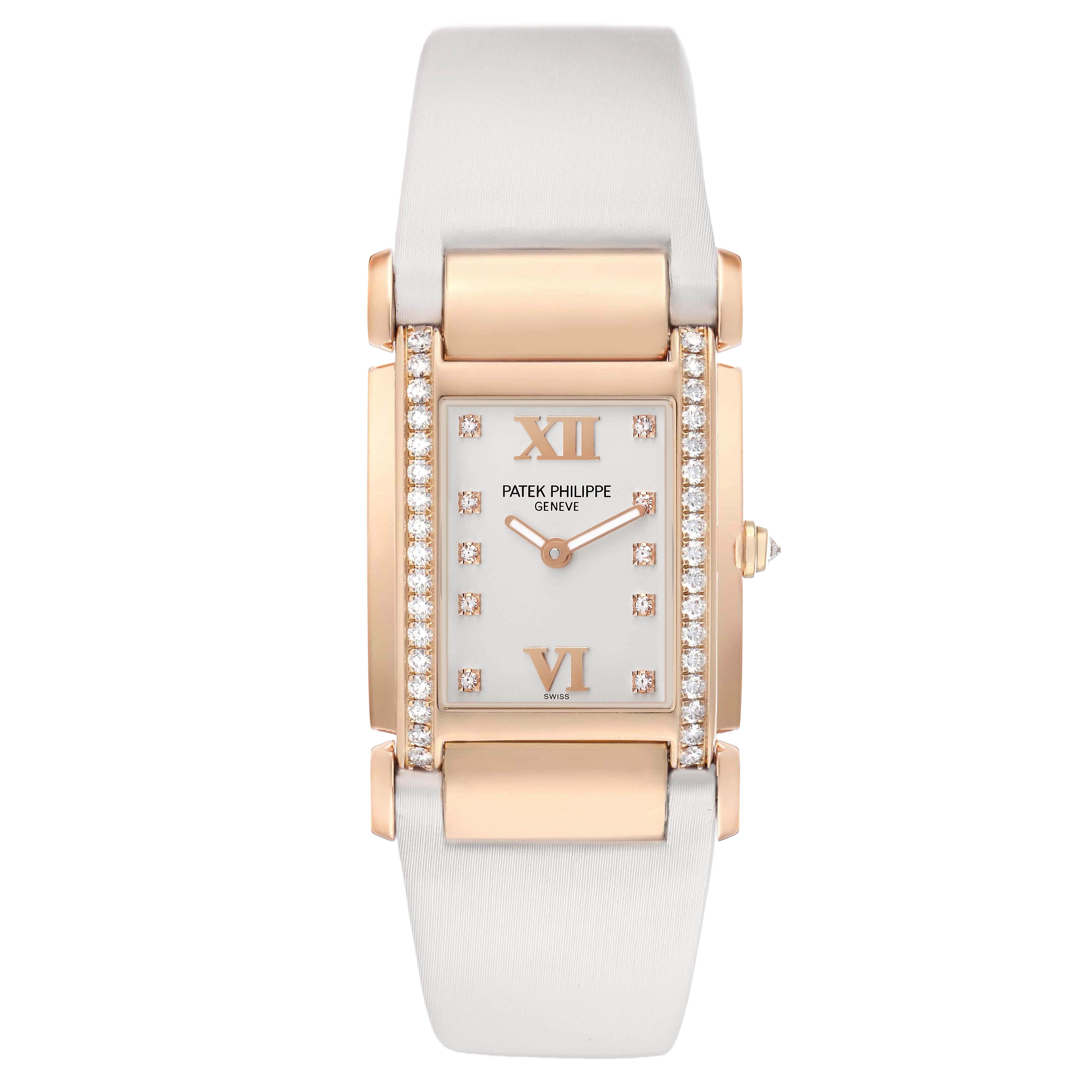 The Patek Philippe Twenty-4 4920R-010 Women's Rose Gold Silver Dial watch is shown from a top view, highlighting its rectangular face with diamond detailing and gold accents.