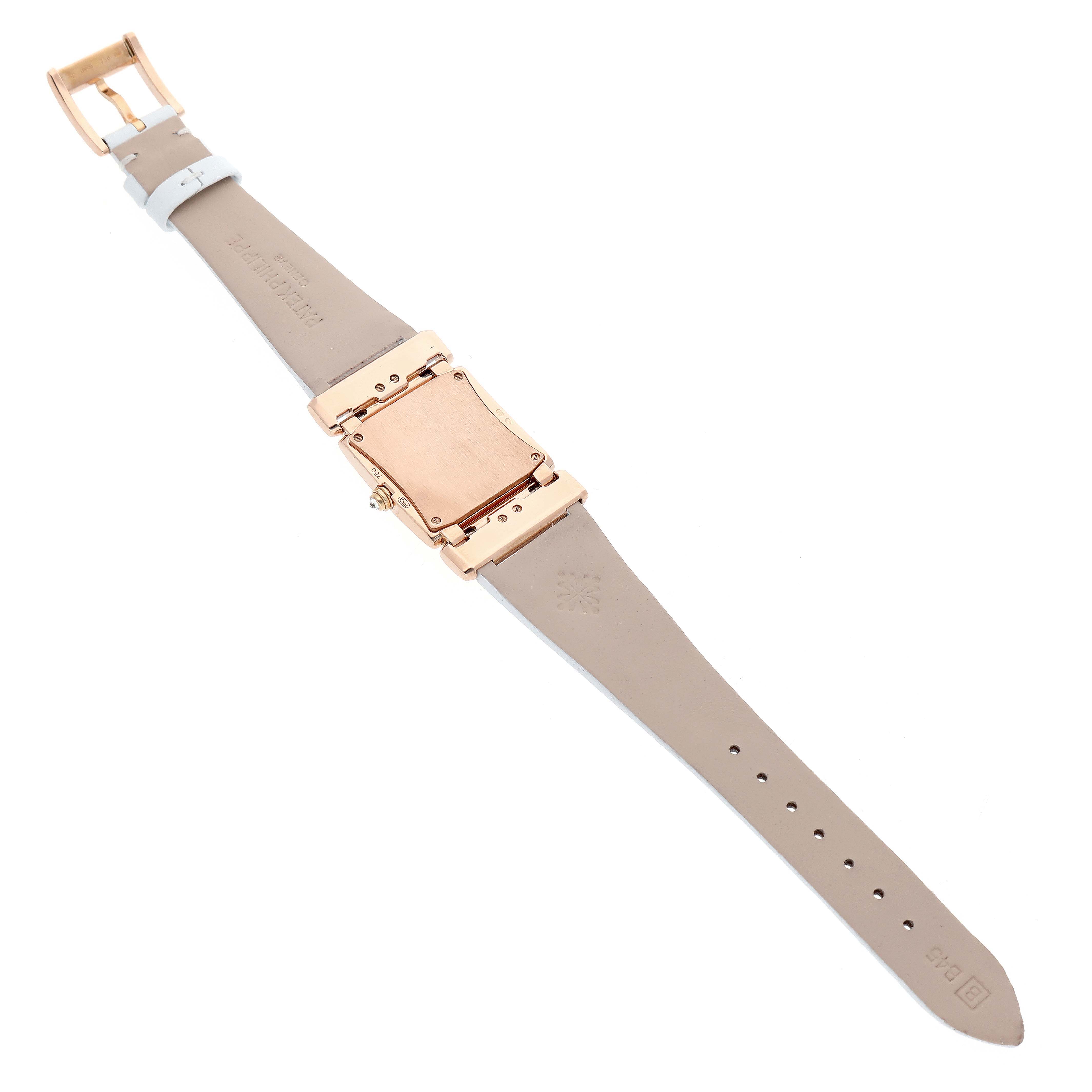 The image shows the back of a Patek Philippe Twenty-4 4920R-010 Women's Rose Gold Silver Dial watch, displaying the case back and leather strap from a top-down angle.