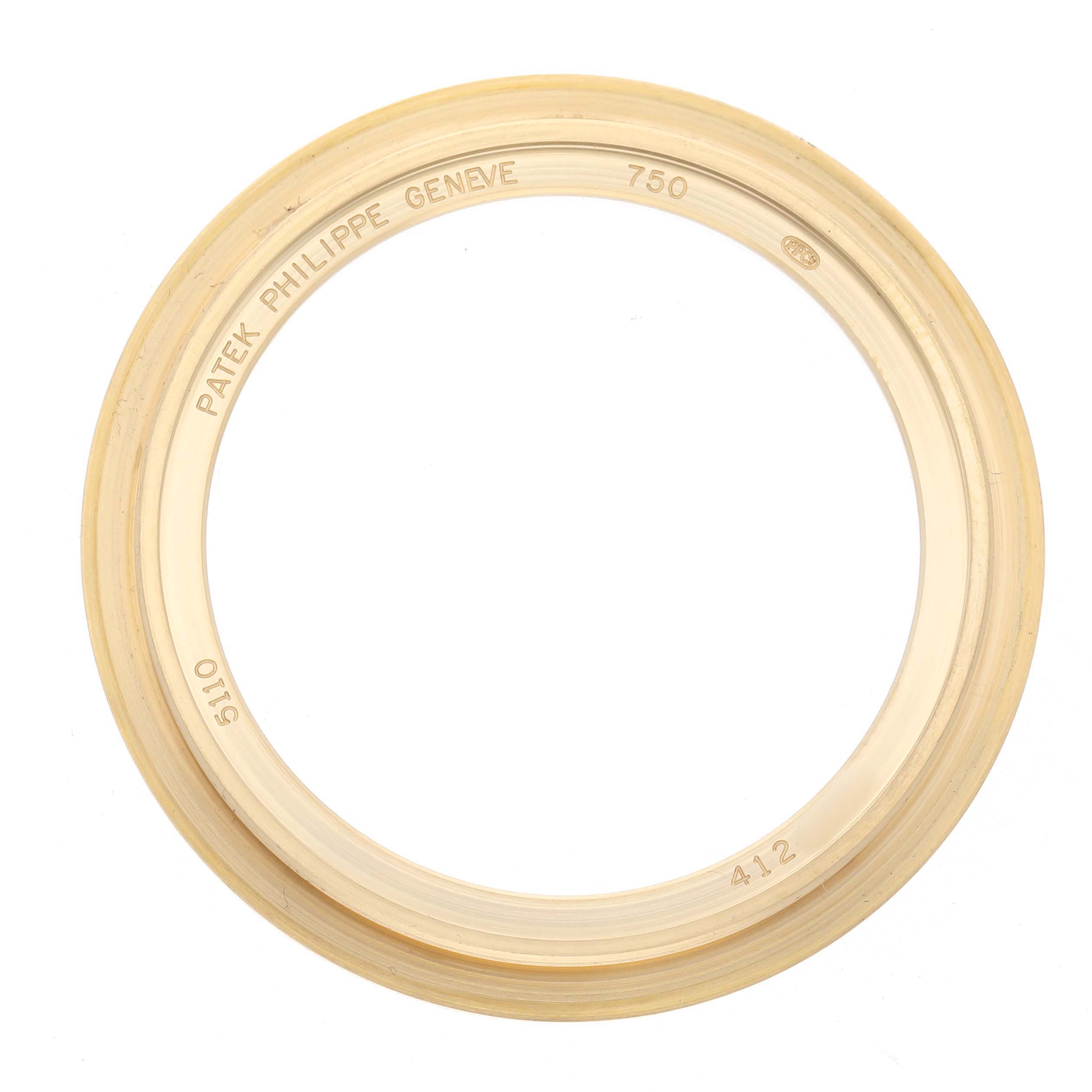 The image shows a top-down view of a watch bezel for a Patek Philippe Complications 5110J-001 Men's Yellow Gold Silver Dial model, featuring engraved markings.