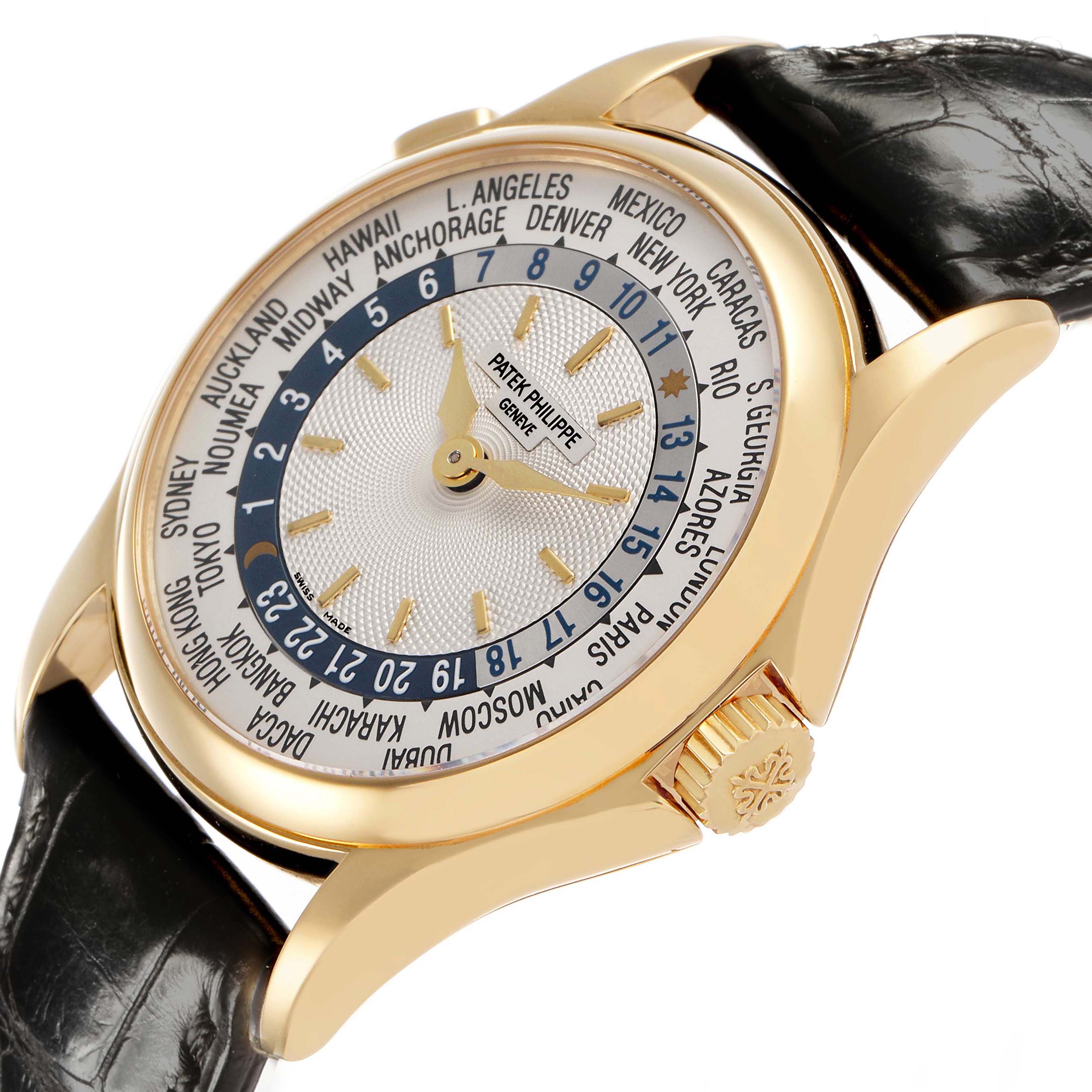 The Patek Philippe Complications 5110J-001 Men's Yellow Gold Silver Dial watch is shown at an angled side view, highlighting the dial, bezel, crown, and leather strap.
